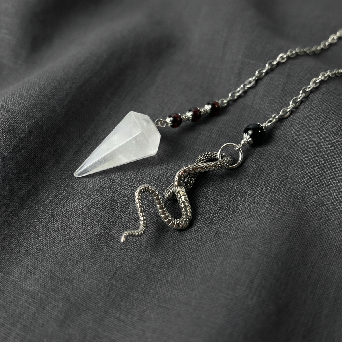 Quartz, garnet and obsidian snake dowsing pendulum Baguette Magick