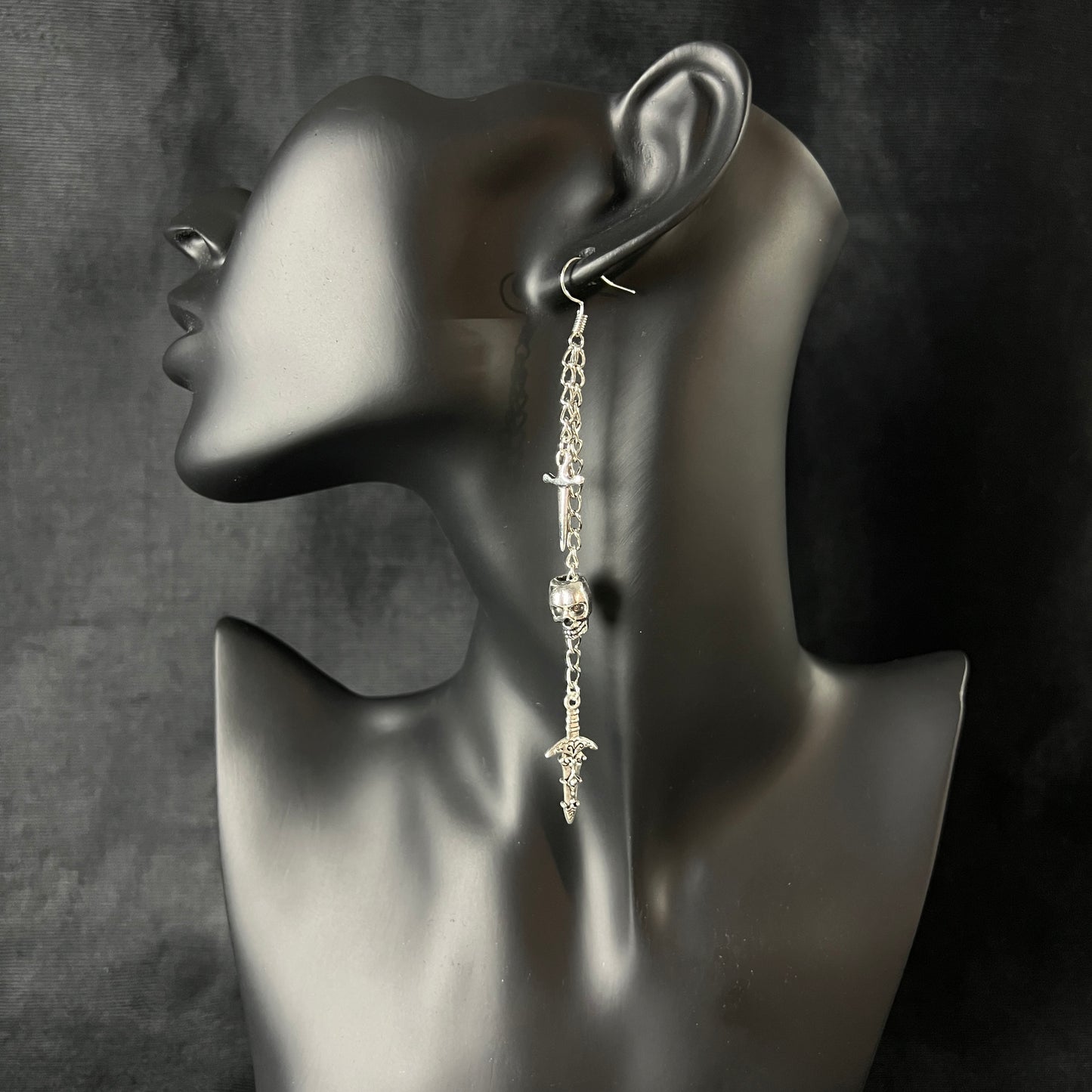 Skull and daggers dangle & drop earrings Baguette Magick