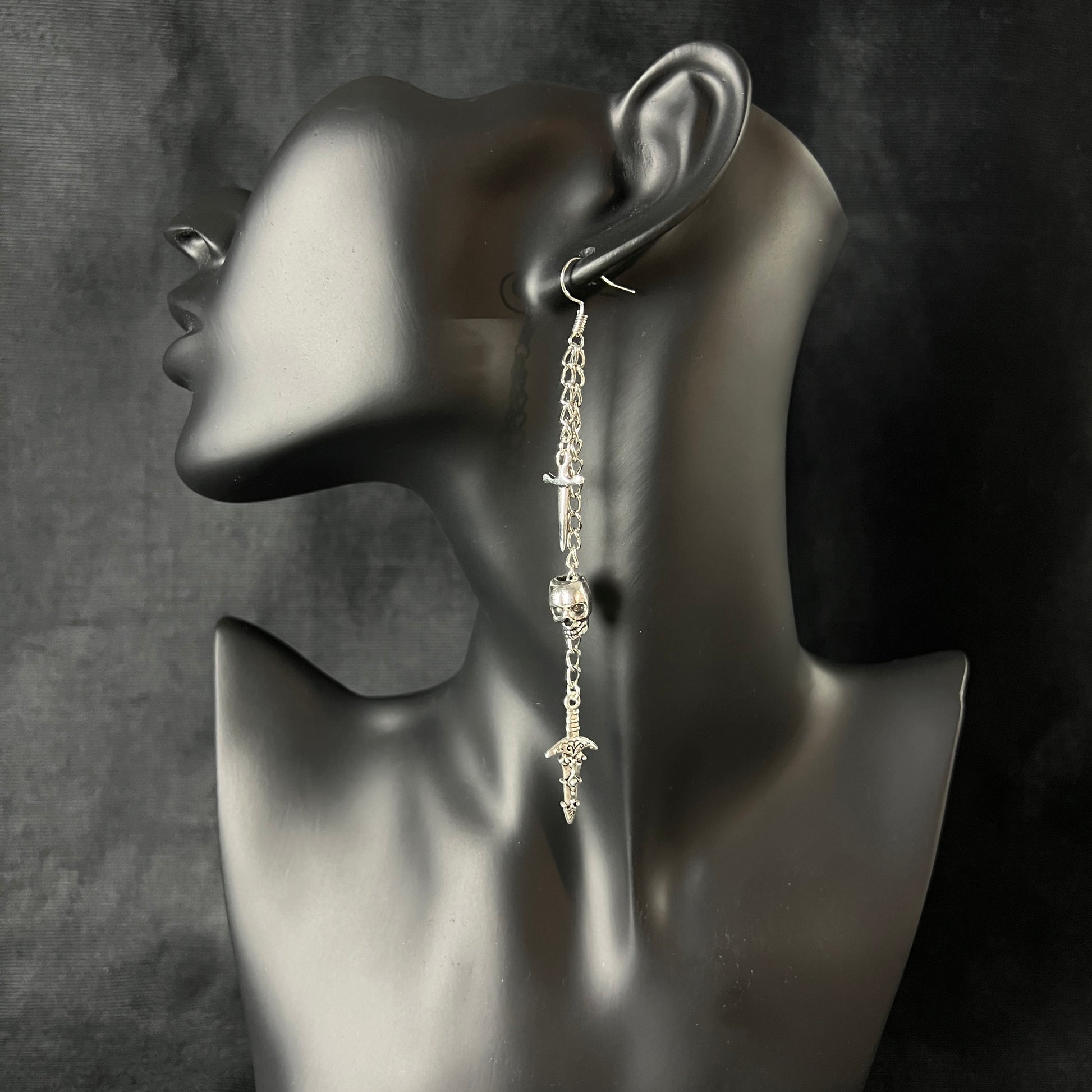 Skull and daggers dangle & drop earrings Baguette Magick
