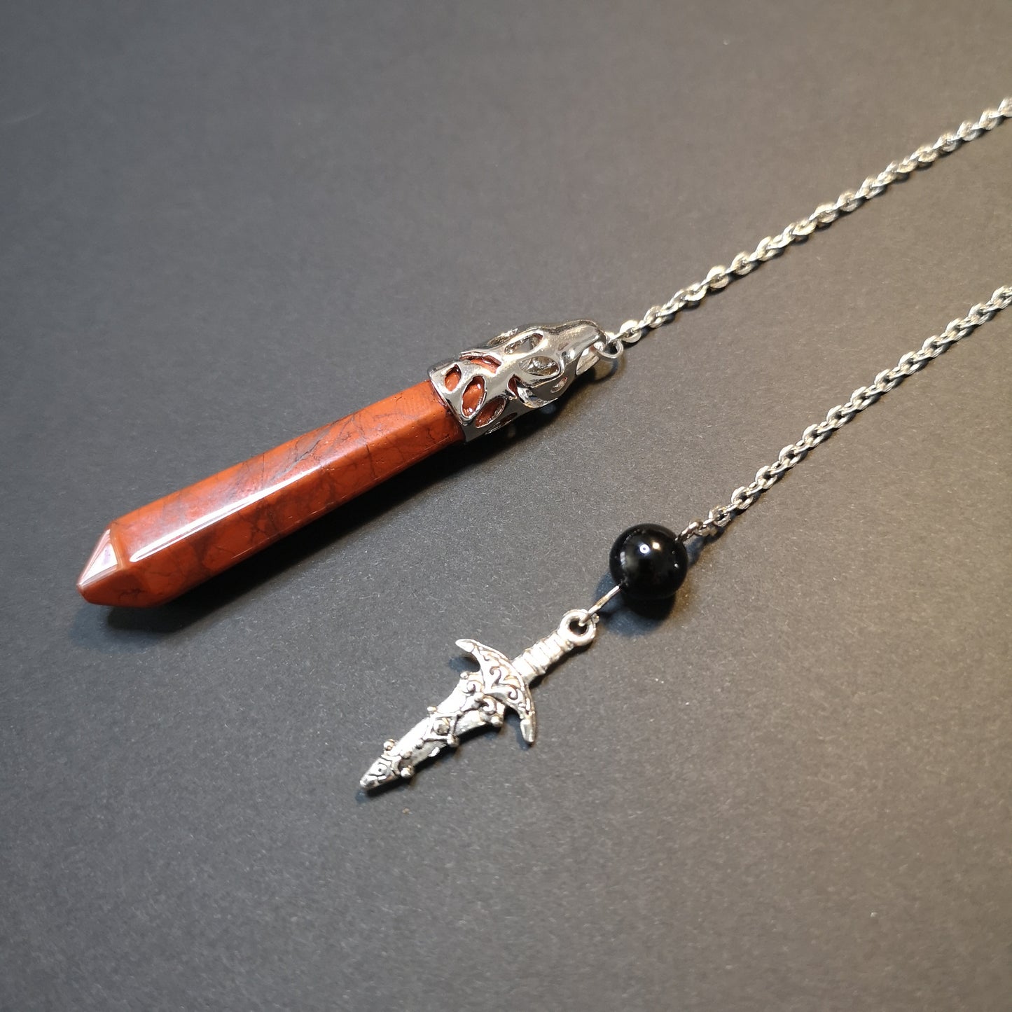 Red jasper and obsidian dagger pendulum Baguette Magick