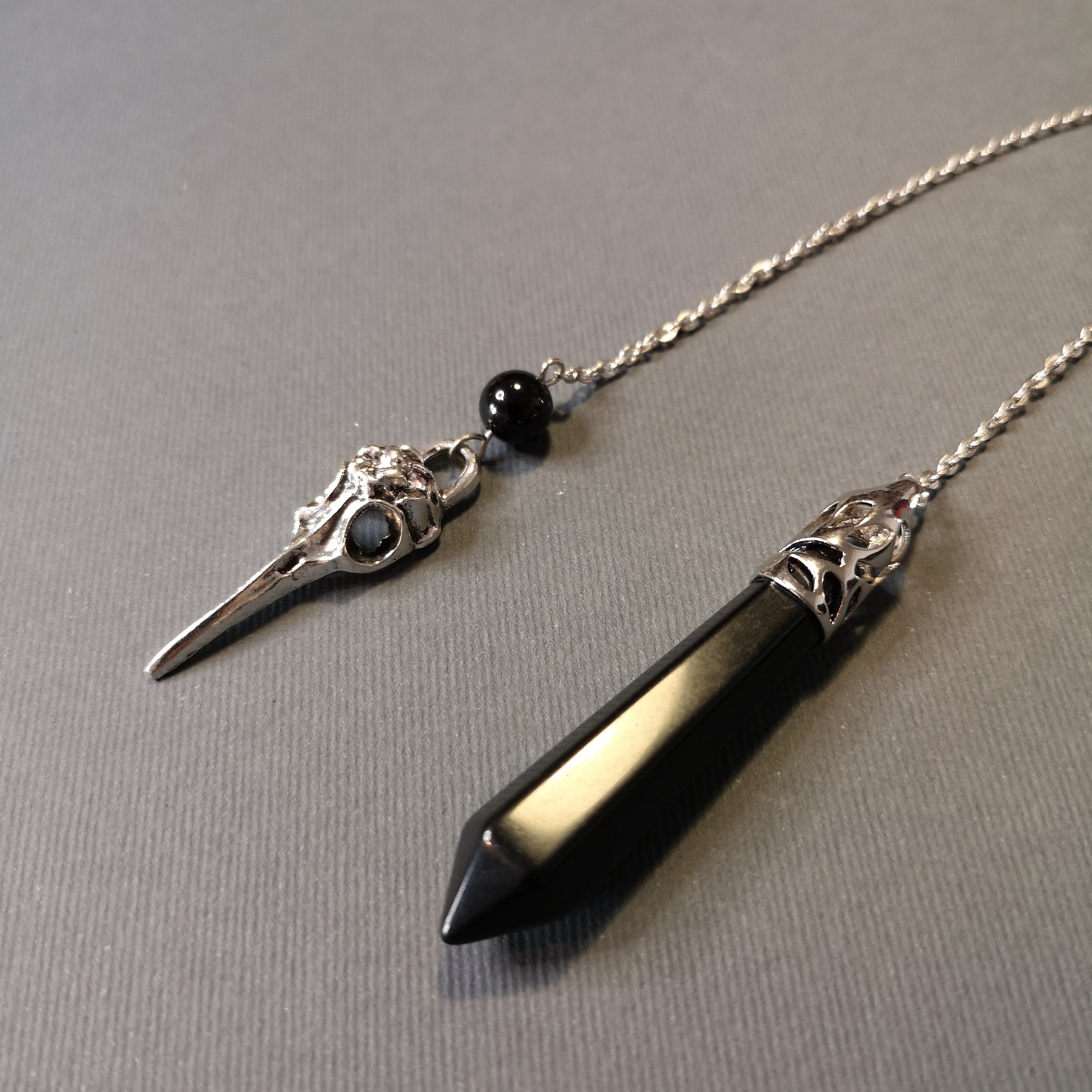 Onyx and bird skull dowsing pendulum Baguette Magick