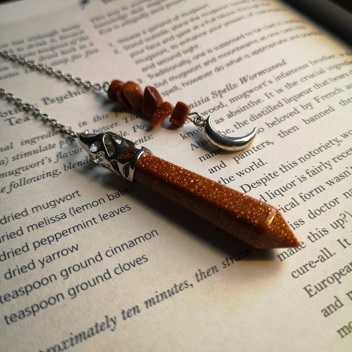 Goldstone pendulum with a crescent moon Baguette Magick