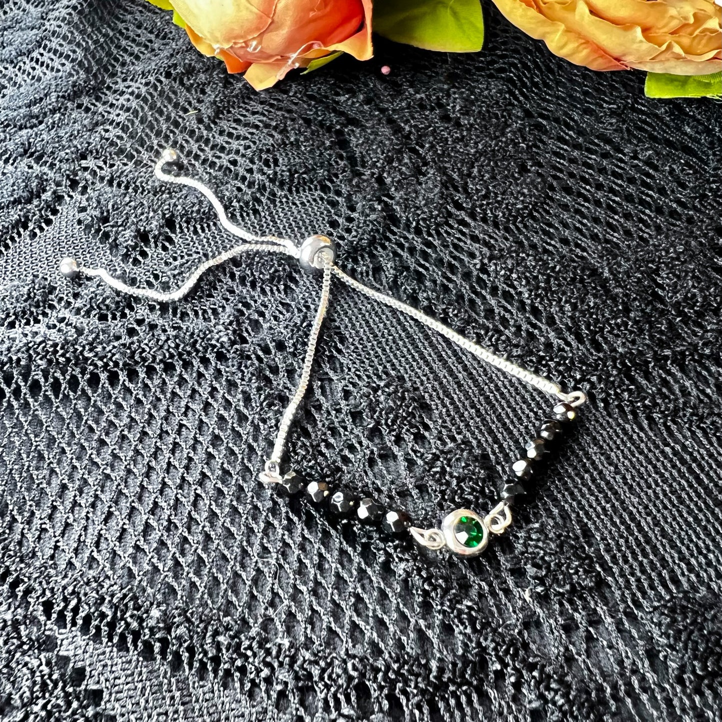 Faceted onyx and emerald green rhinestone stainless steel slider bracelet Baguette Magick