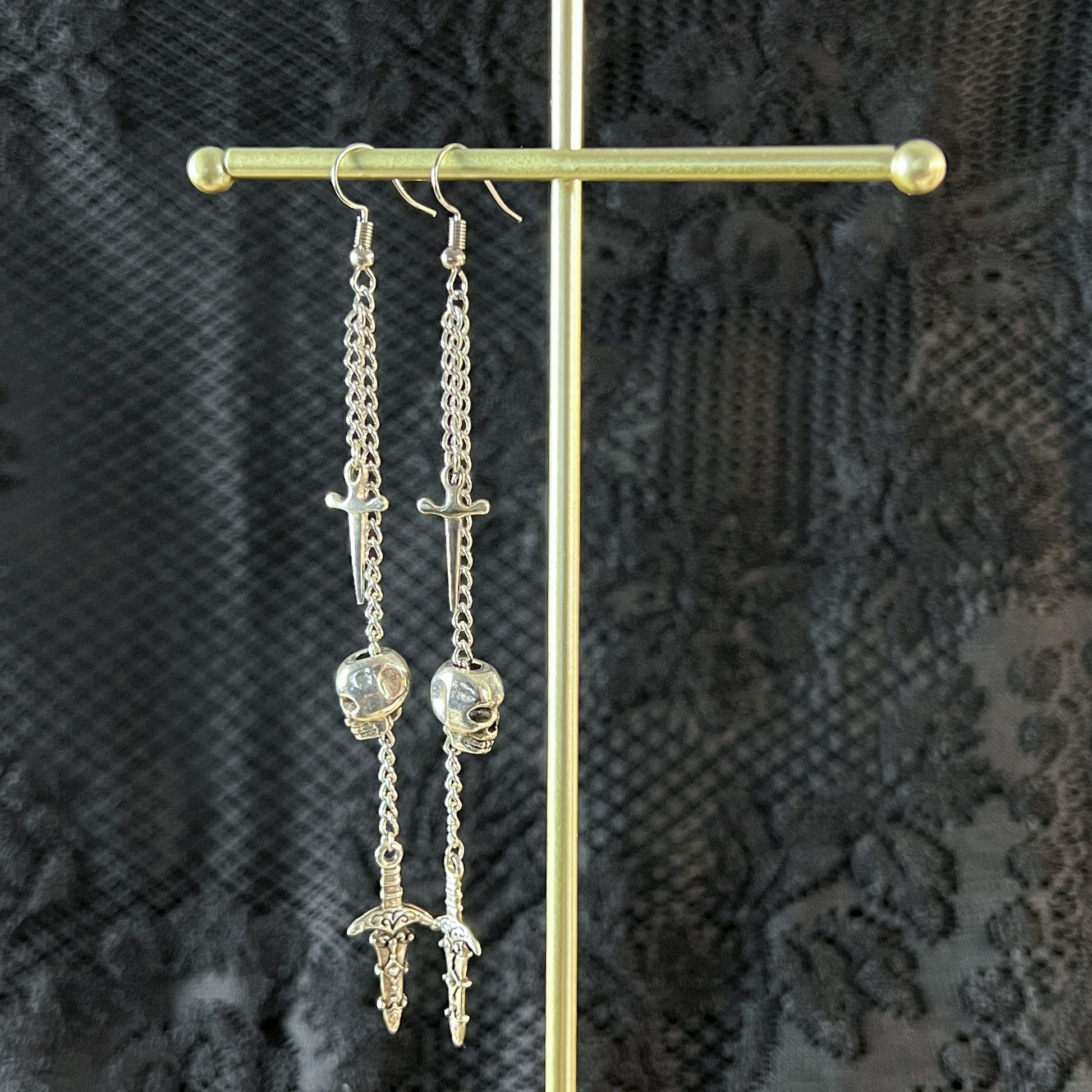 Skull and daggers dangle & drop earrings Baguette Magick