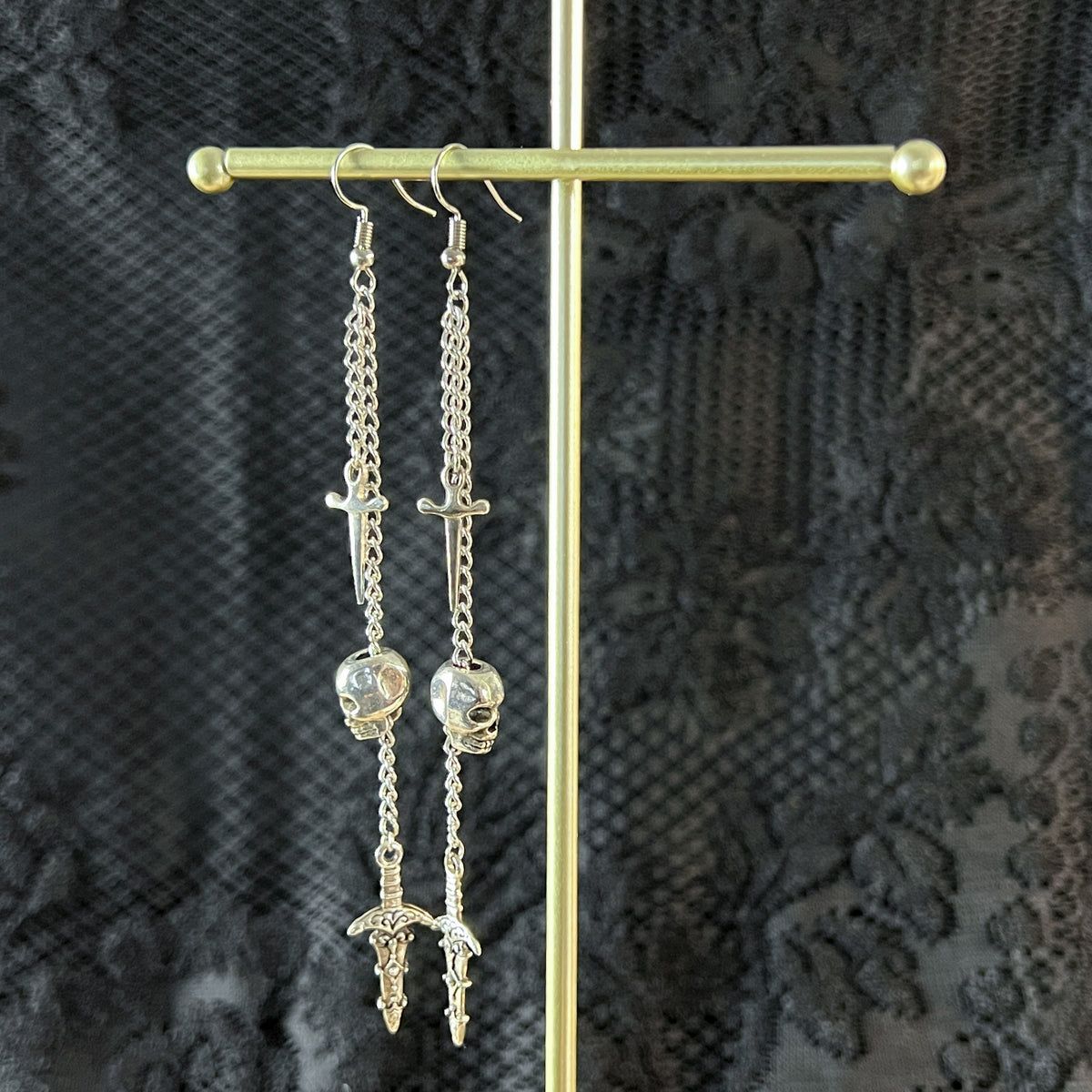 Skull and daggers dangle & drop earrings Baguette Magick