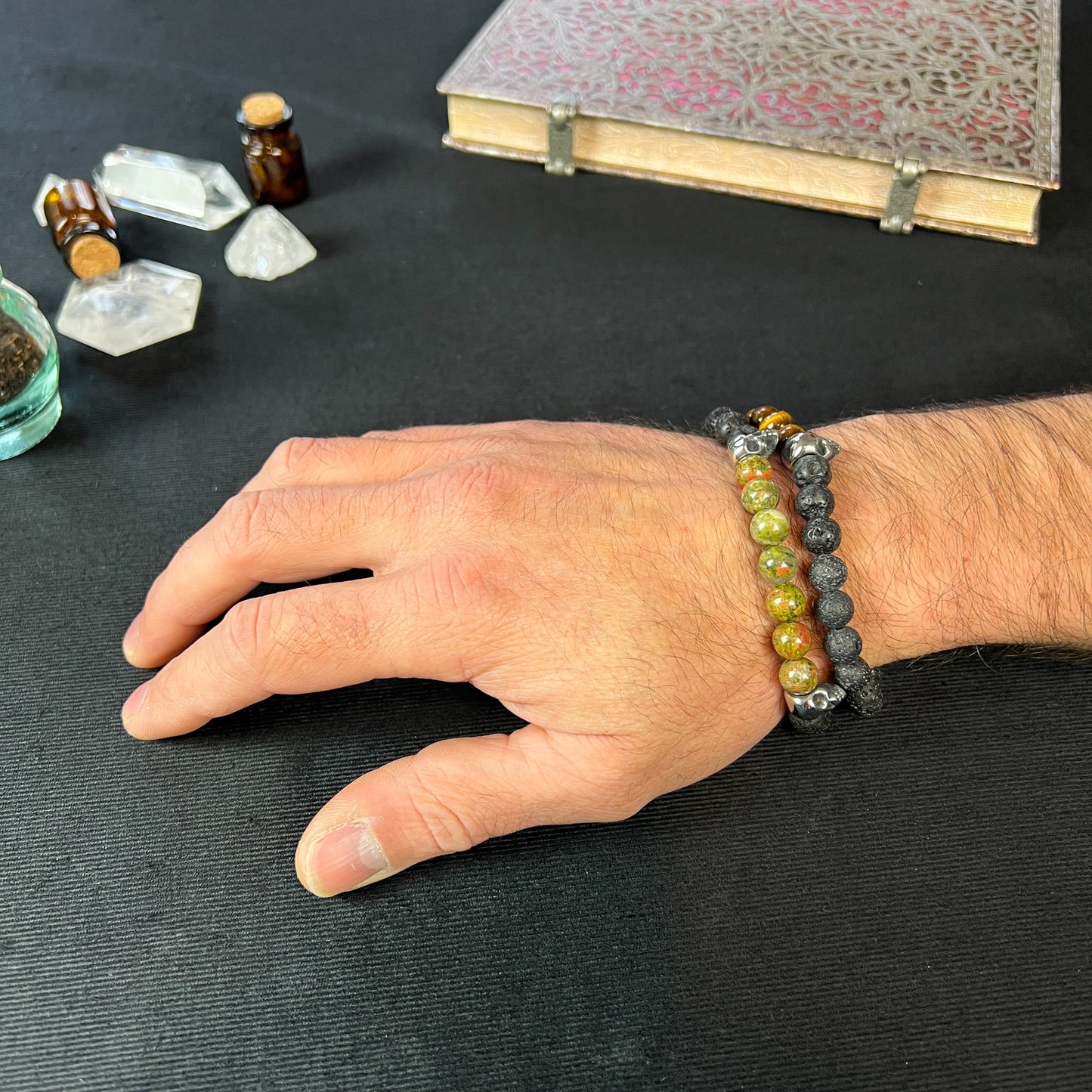 Lava rock and unakite or tiger's eye mala bracelet, with stainless steel skulls Baguette Magick