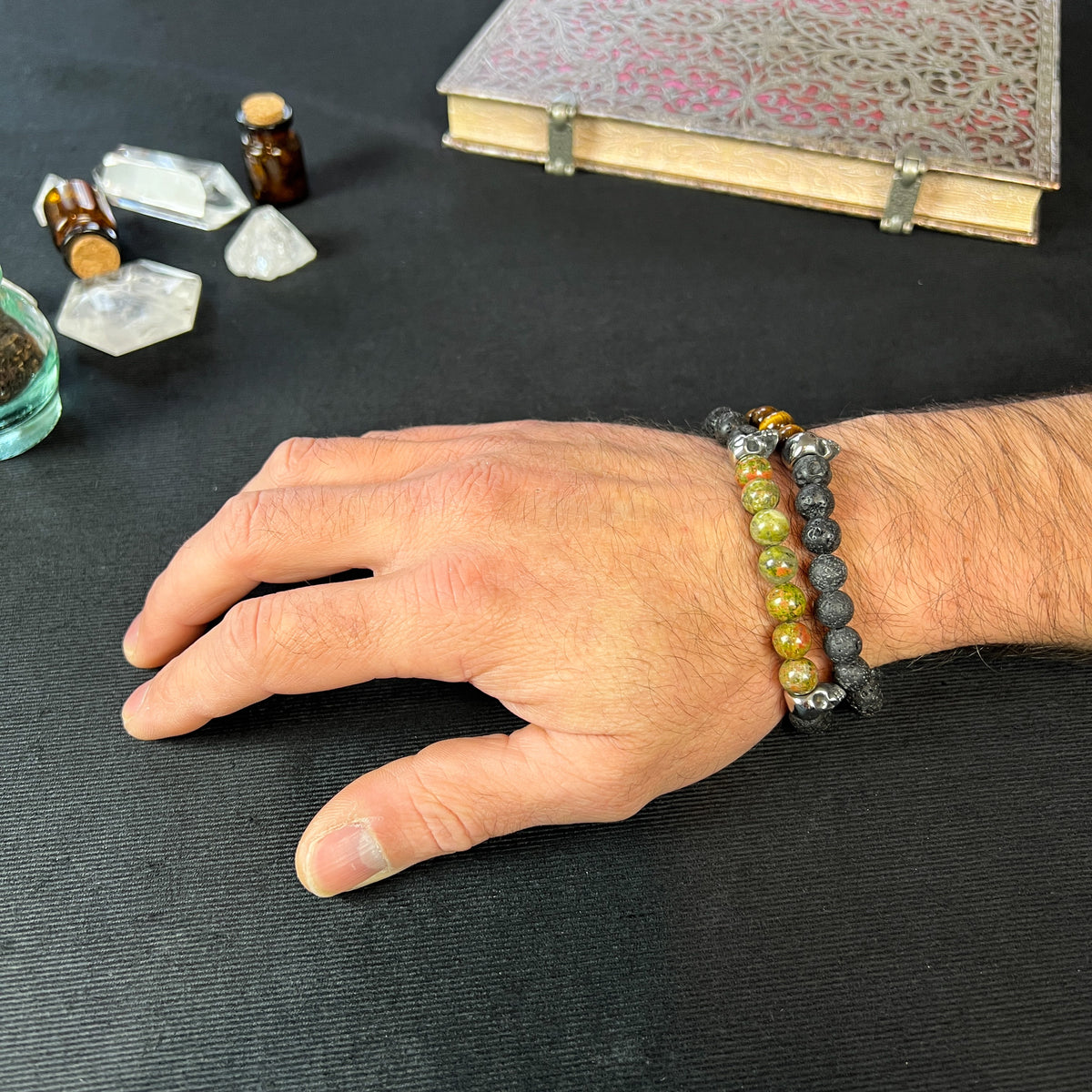 Lava rock and unakite or tiger's eye mala bracelet, with stainless steel skulls Baguette Magick