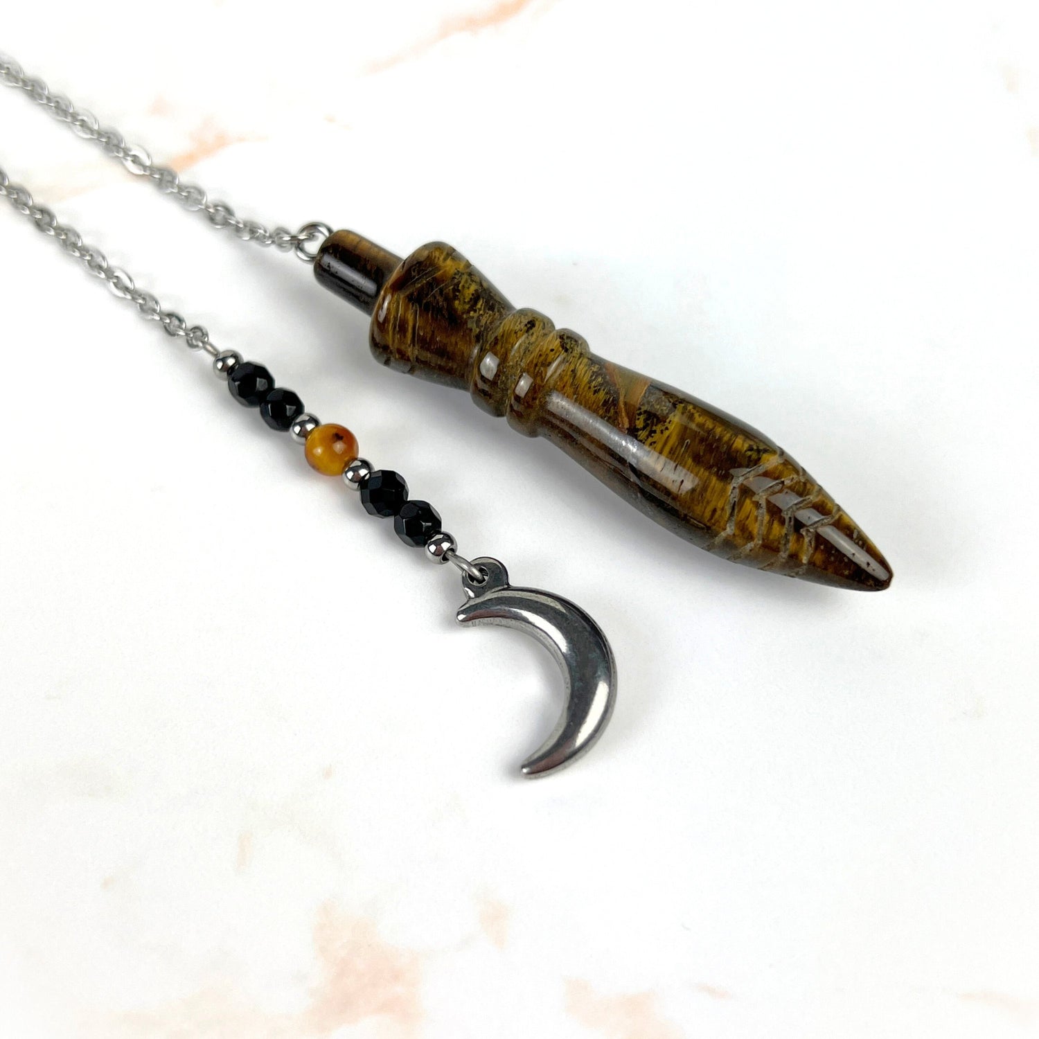 tiger eye thot pendulum dowsing divination