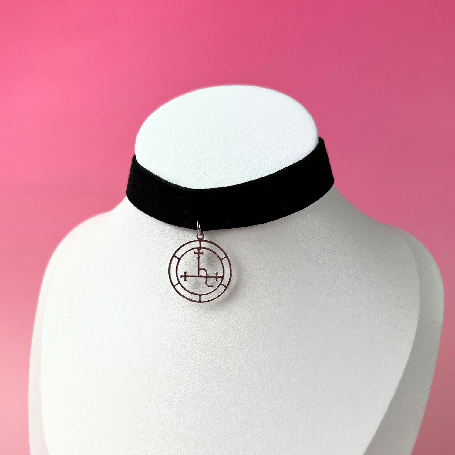 black velvet choker with a silver tone sigil of Lilith pendant