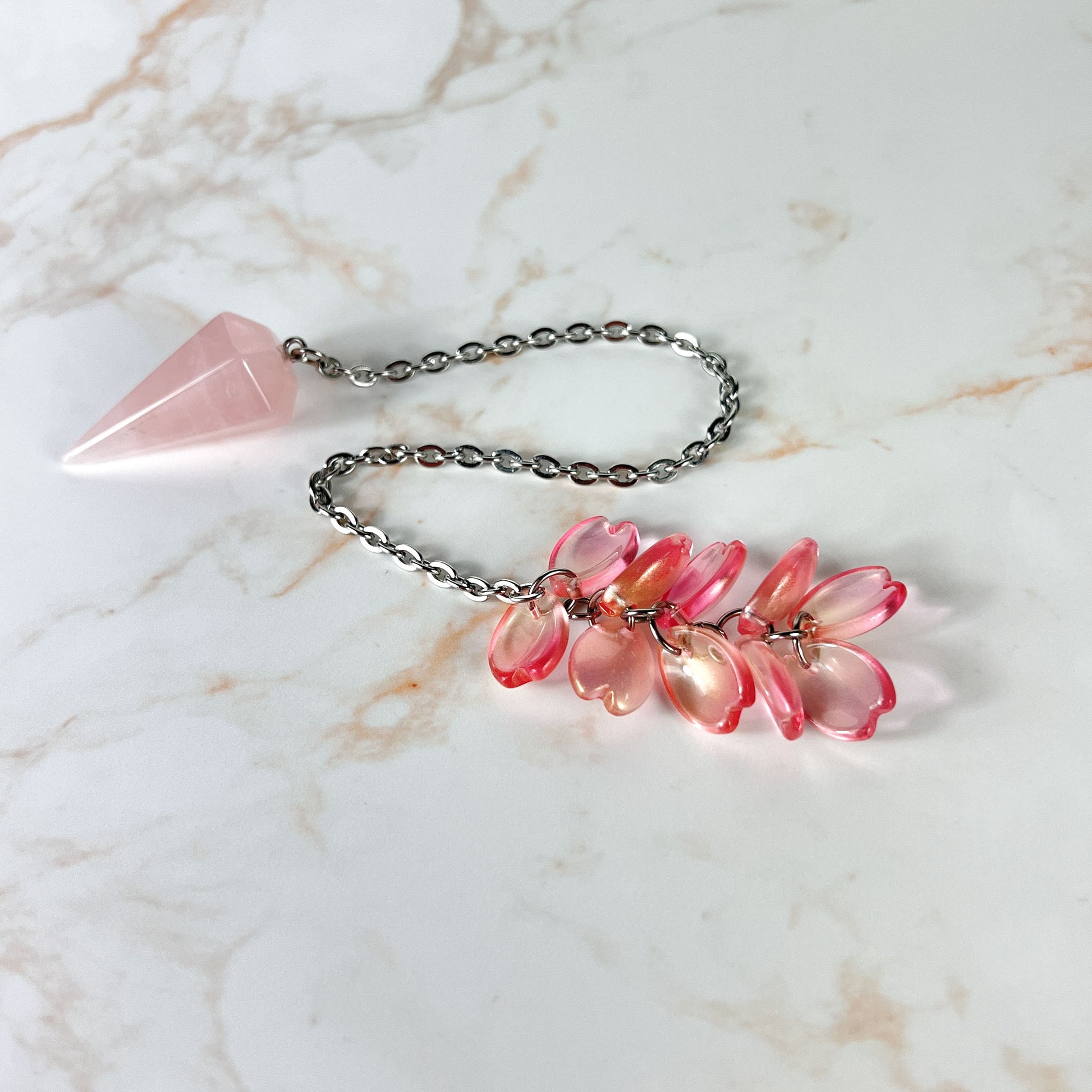 Rose quartz and sakura petals dowsing pendulum, stainless steel Baguette Magick