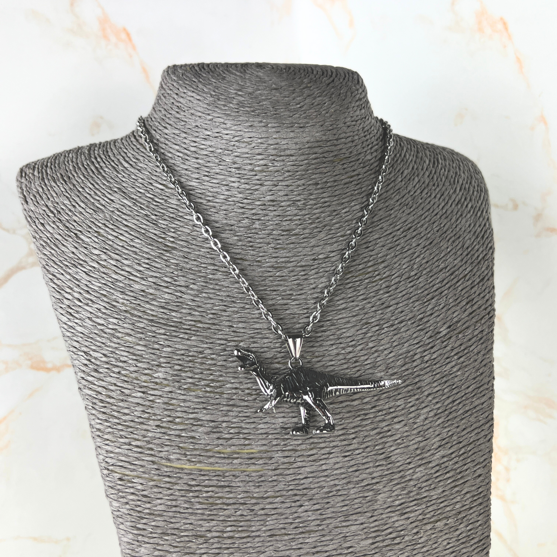 Raptor dinosaur necklace, stainless steel Baguette Magick