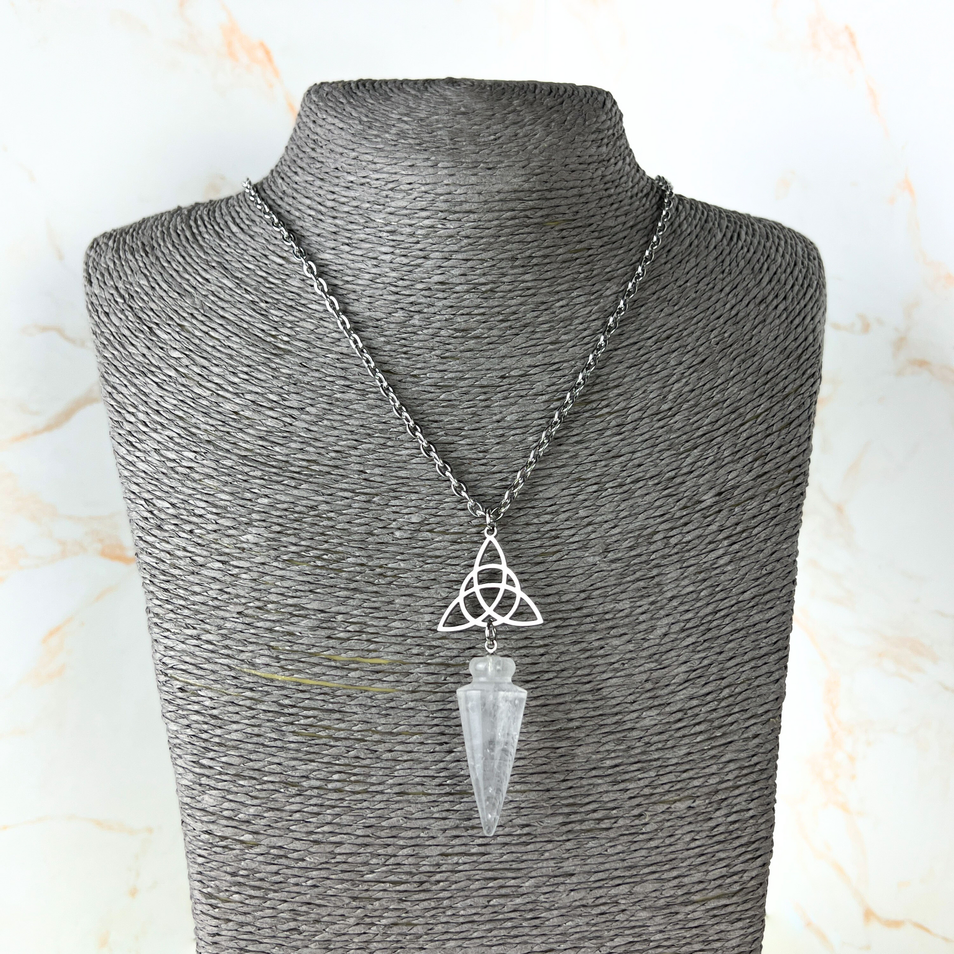 Clear quartz and triquetra Celtic knot pendulum necklace, stainless steel Baguette Magick