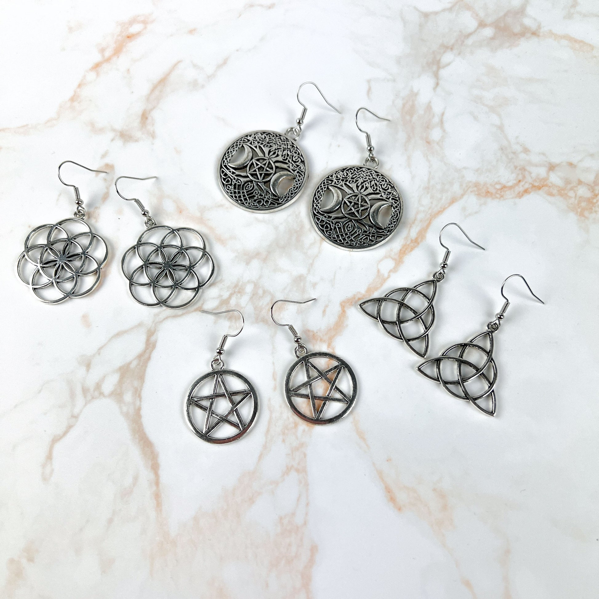 Spiritual earrings bundle: Triquetra, Pentacle, Triple Moon and Flower of life Baguette Magick