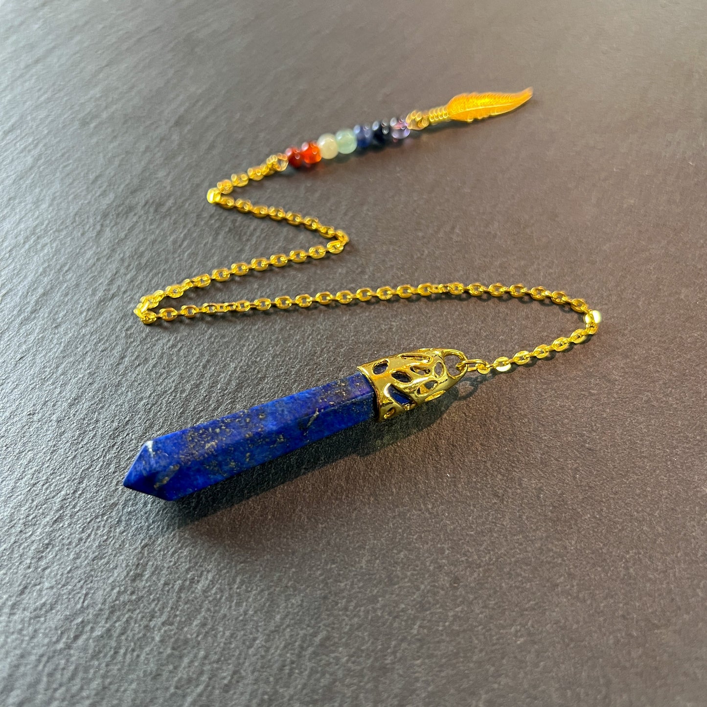 lapis lazuli gemstone dowsing pendulum gold divination witchcraft feather 7 chakras