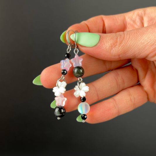 The Celestial Nocture earrings: Rainbow Obsisidan, Onyx, Holo glass, stars and Sakura, stainless steel Baguette Magick