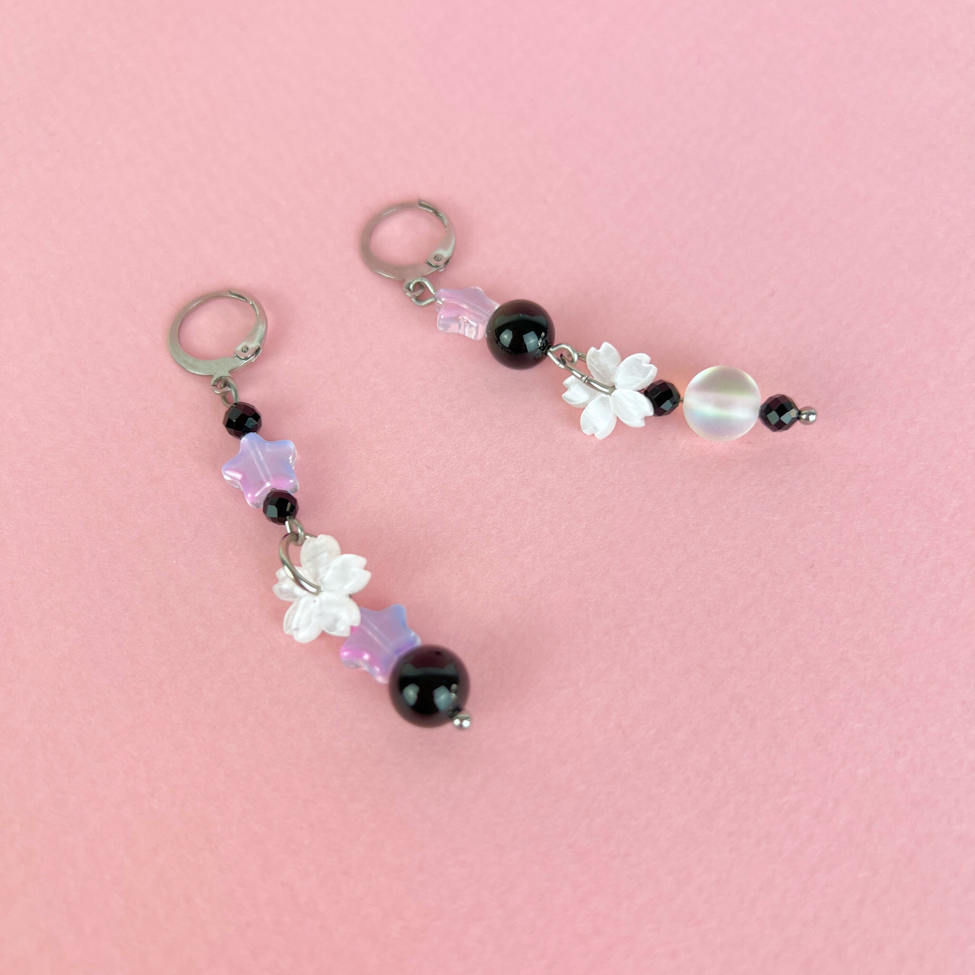 The Celestial Nocture earrings: Rainbow Obsisidan, Onyx, Holo glass, stars and Sakura, stainless steel Baguette Magick