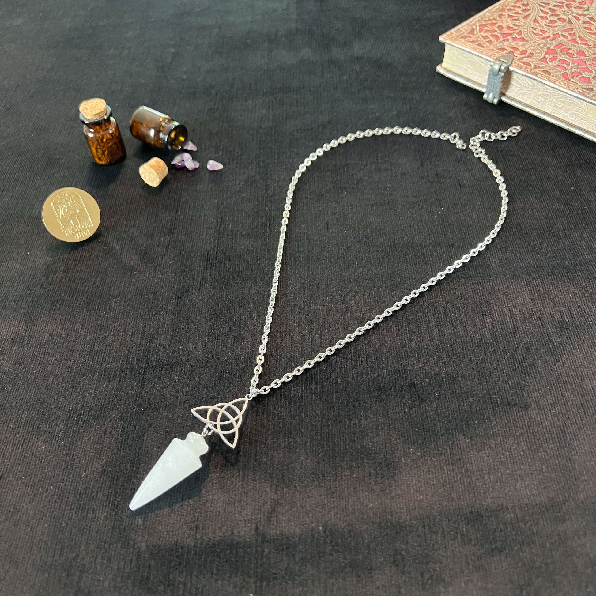Clear quartz and triquetra Celtic knot pendulum necklace, stainless steel Baguette Magick