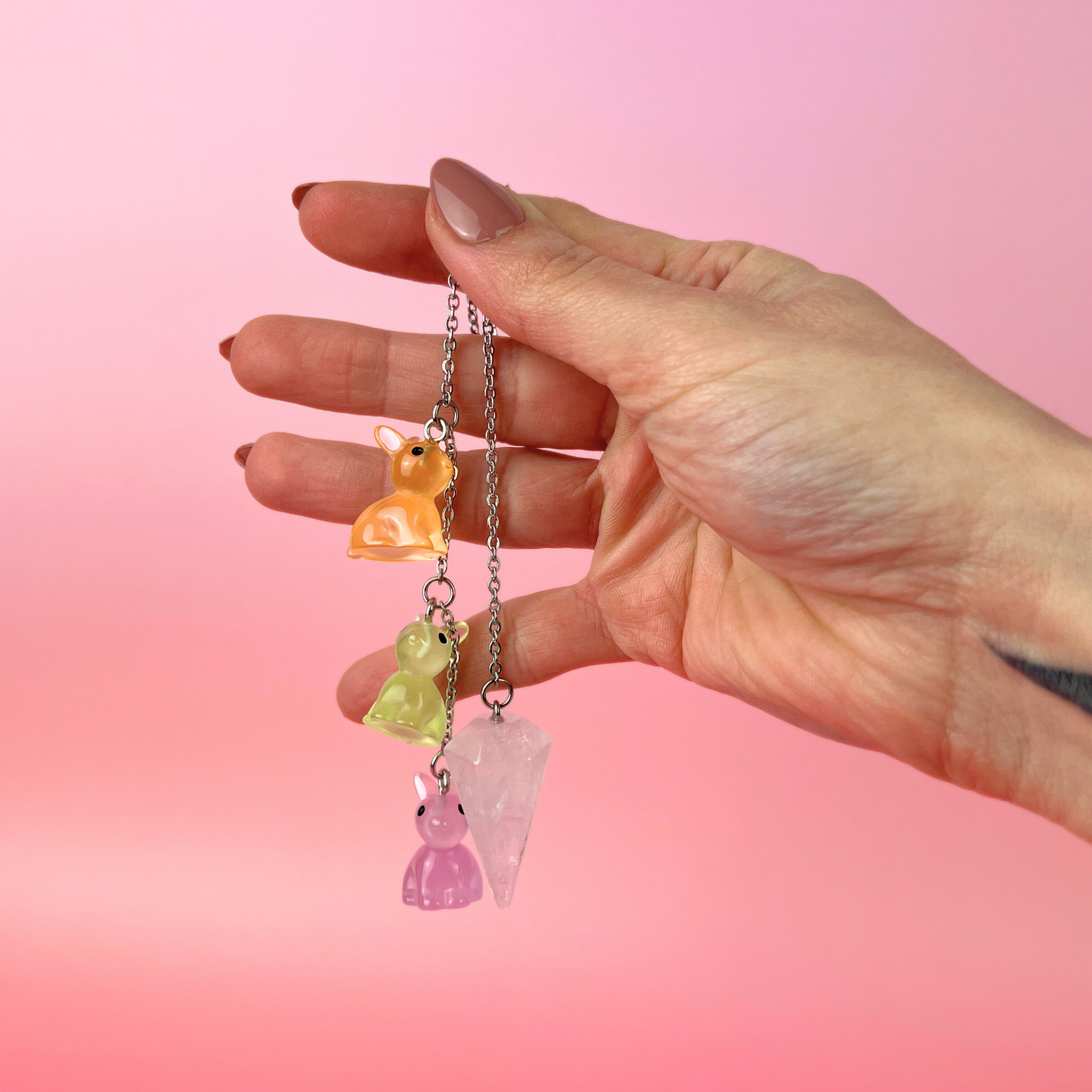 Easter bunnies clear quartz pendulum, stainless steel