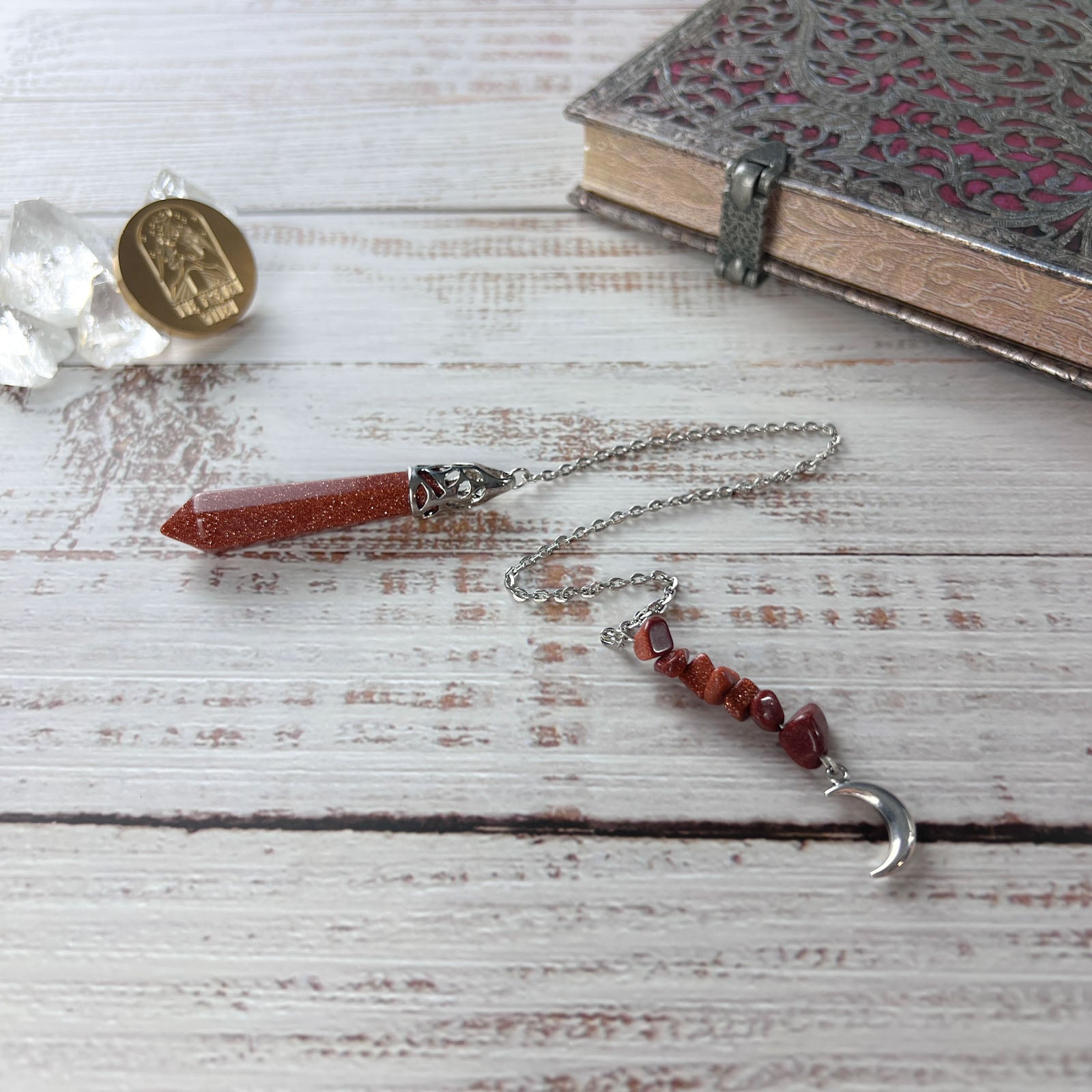 Goldstone pendulum with a crescent moon