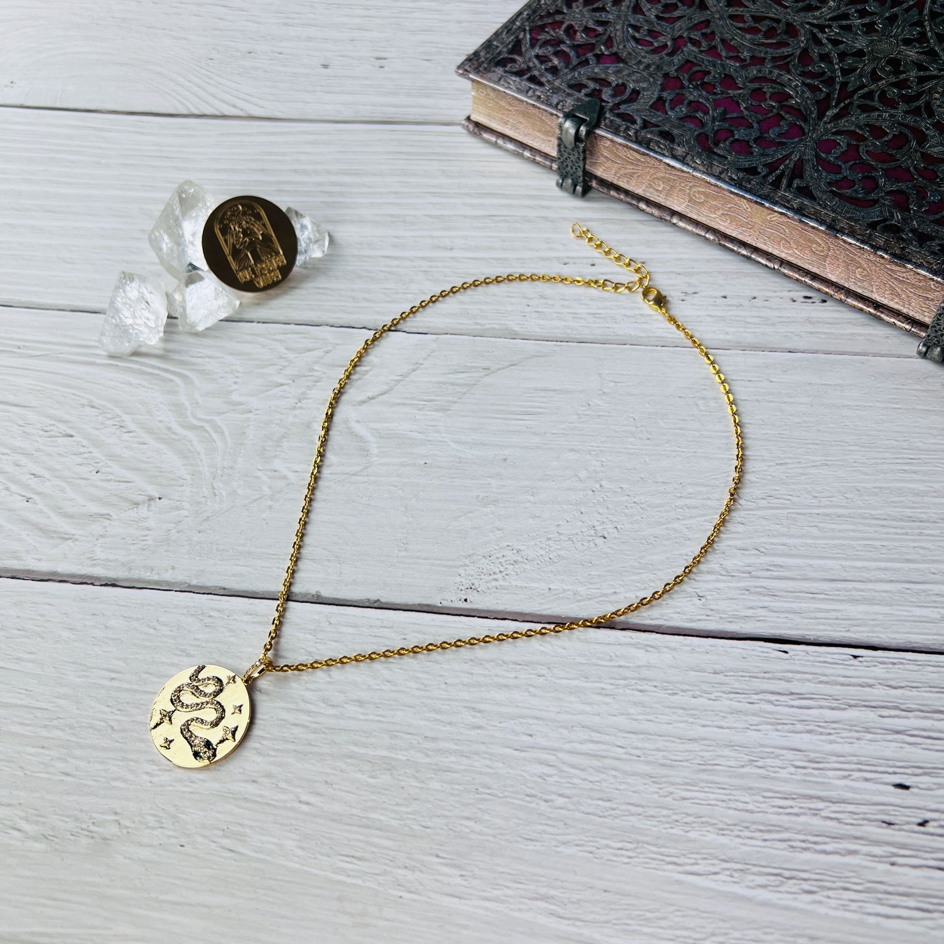 Golden snake amulet necklace with zircon Baguette Magick
