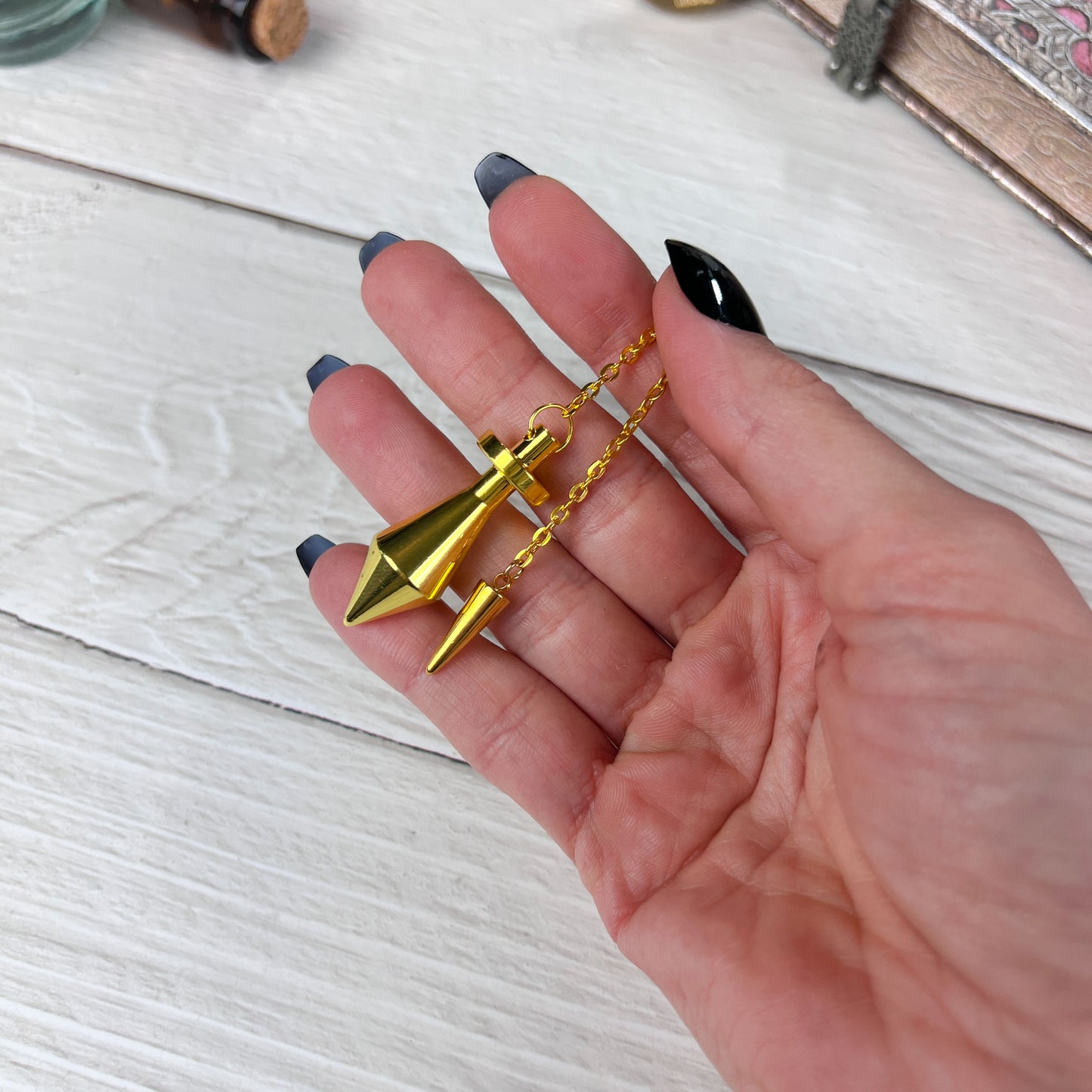 Golden long point dowsing metal pendulum with a spike charm Baguette Magick