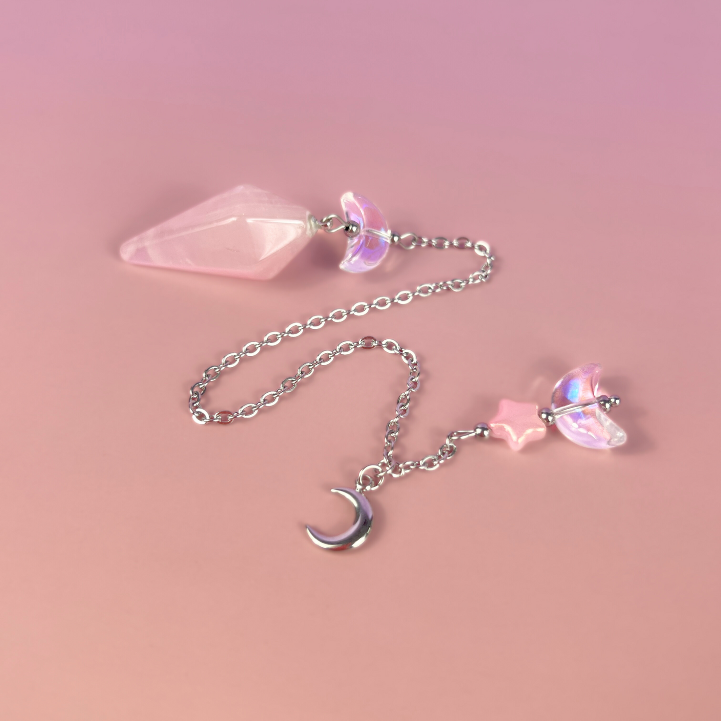 Celestial rose quartz dowsing pendulum, with moon & star charms