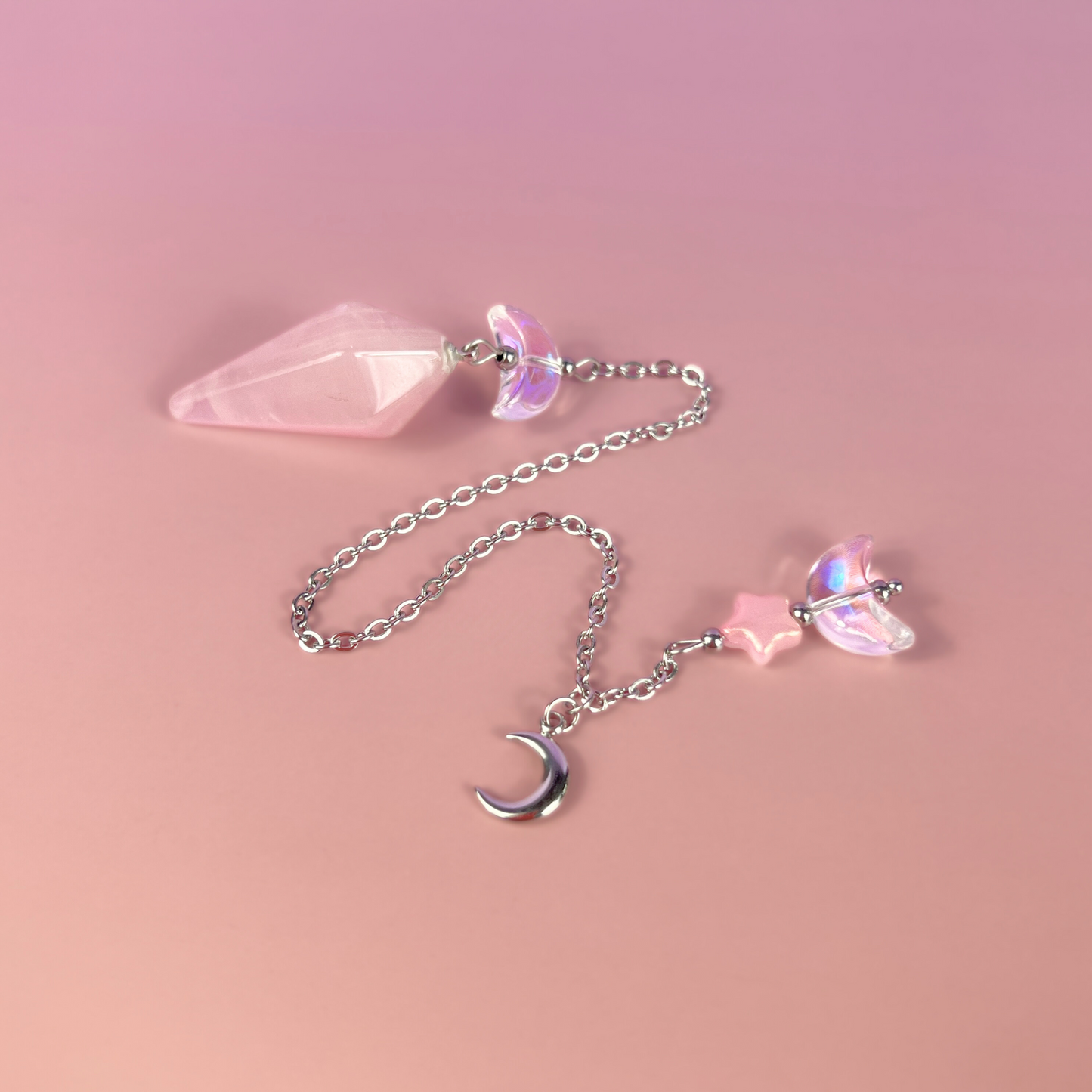 Celestial rose quartz dowsing pendulum, with moon & star charms