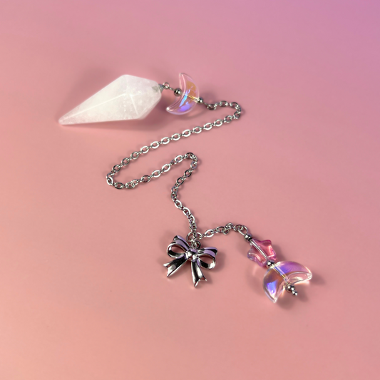 Celestial Clear Quartz dowsing pendulum, with moon, star & bow charms