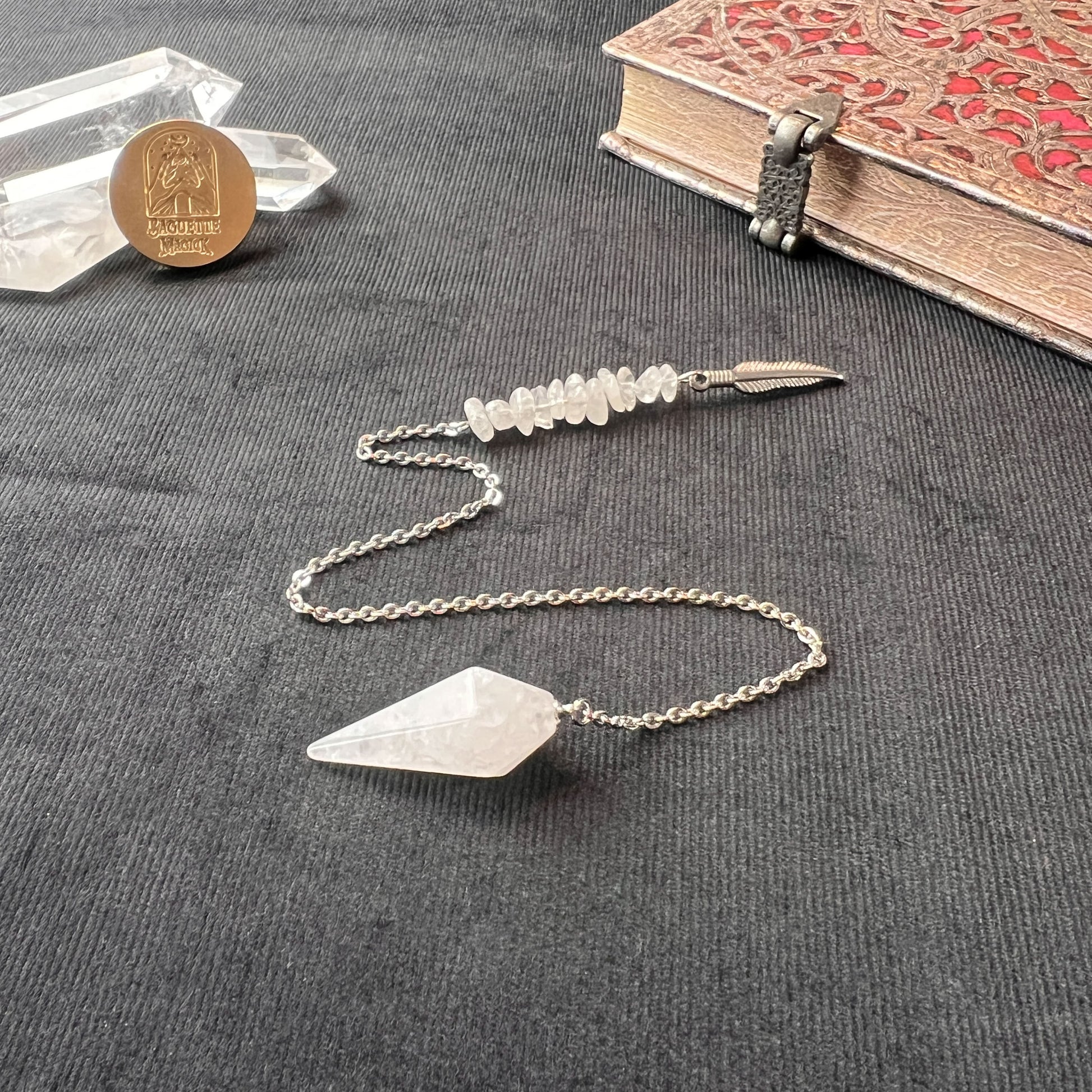 clear quartz gemstone crystal dowsing pendulum feather charm witchcraft altar pagan tool baguette magick