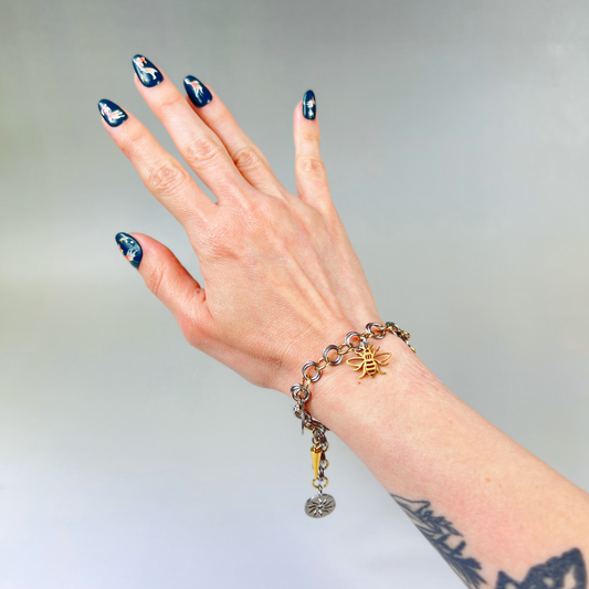 Chainmail charm bracelet, gold and silver tones