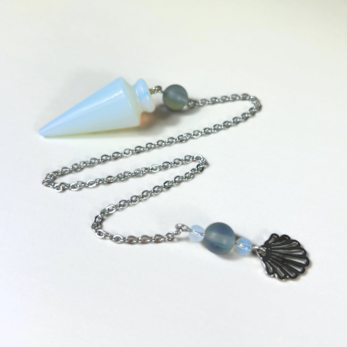 Sea witch pendulum made with opalite, mermaid glass