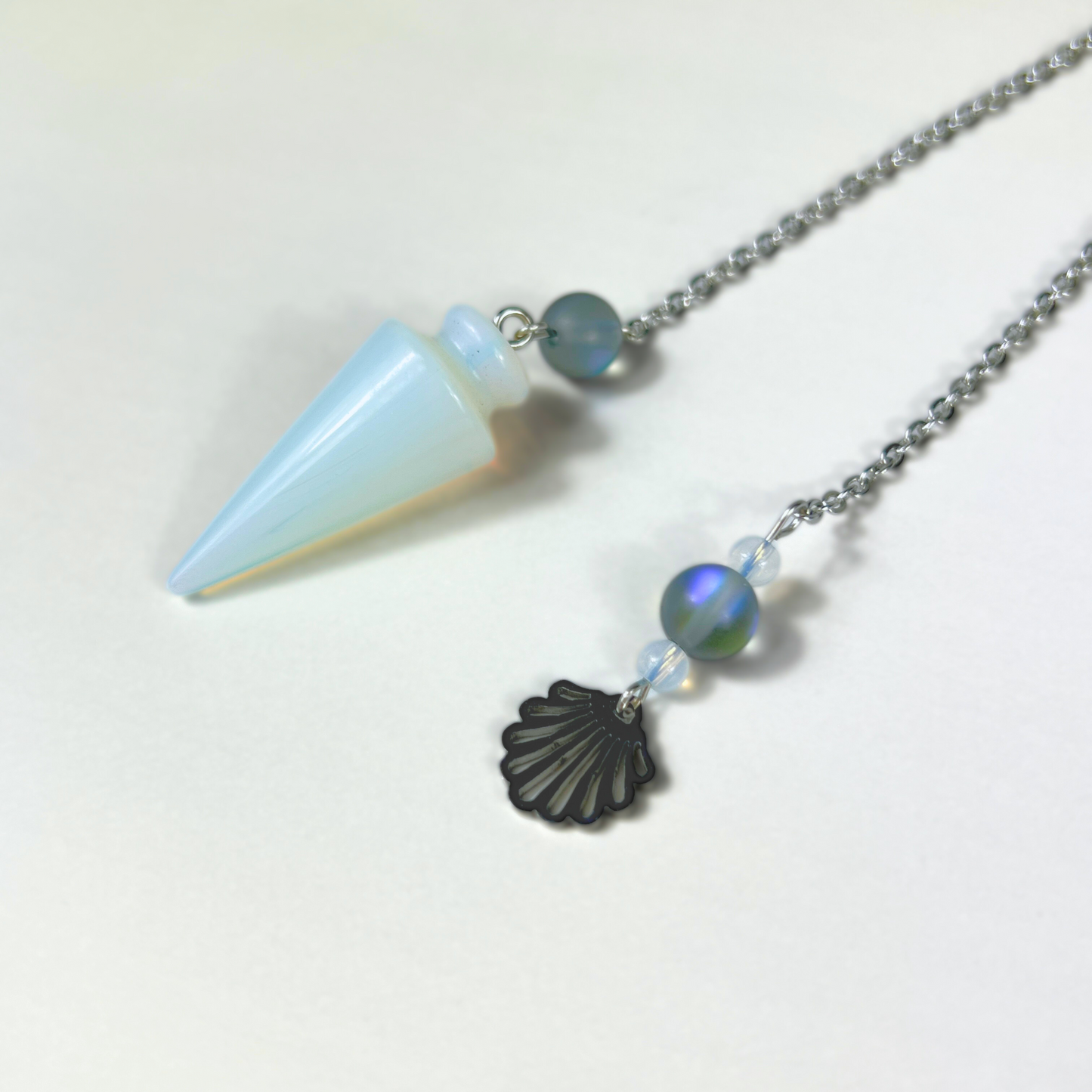 Sea witch pendulum made with opalite, mermaid glass