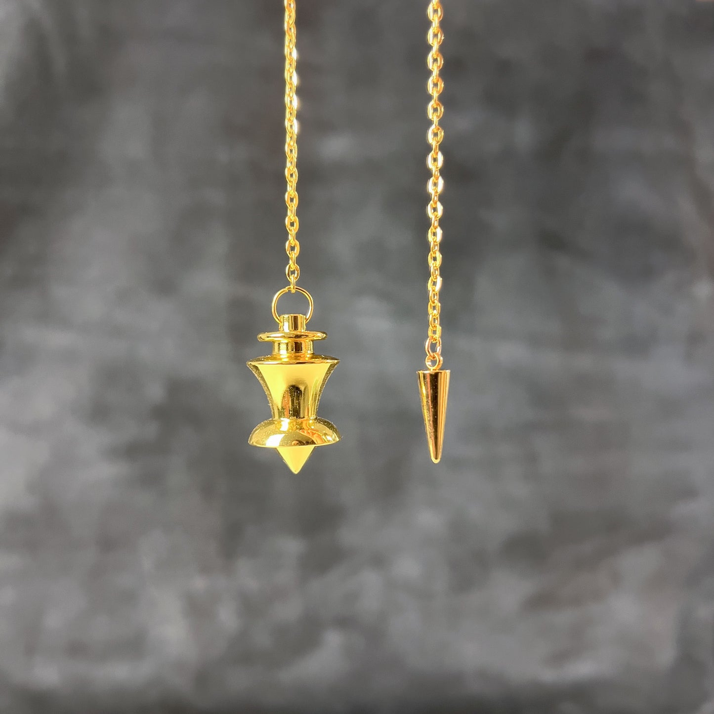 Golden point and dome dowsing metal pendulum with a spike charm Baguette Magick