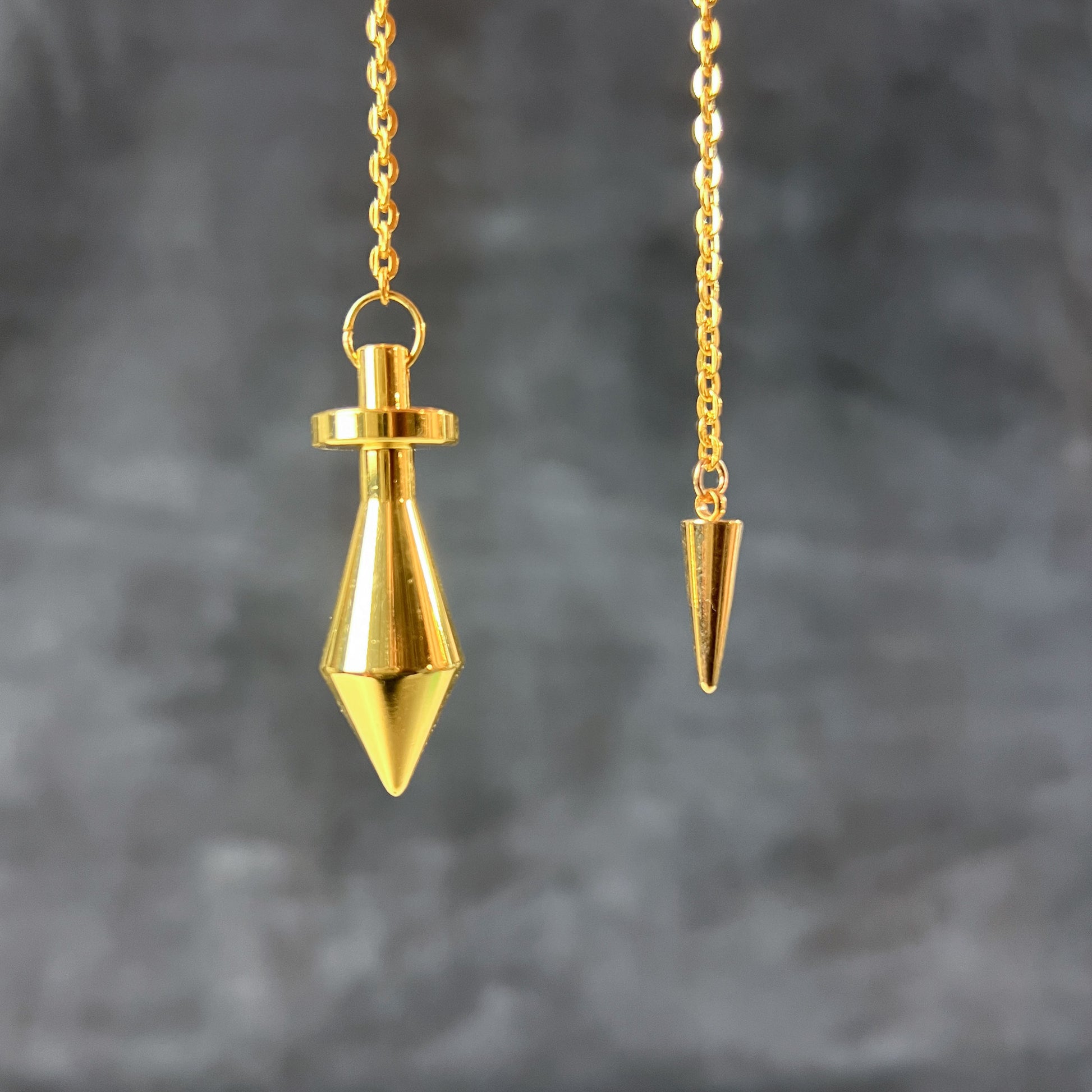 Golden long point dowsing metal pendulum with a spike charm Baguette Magick