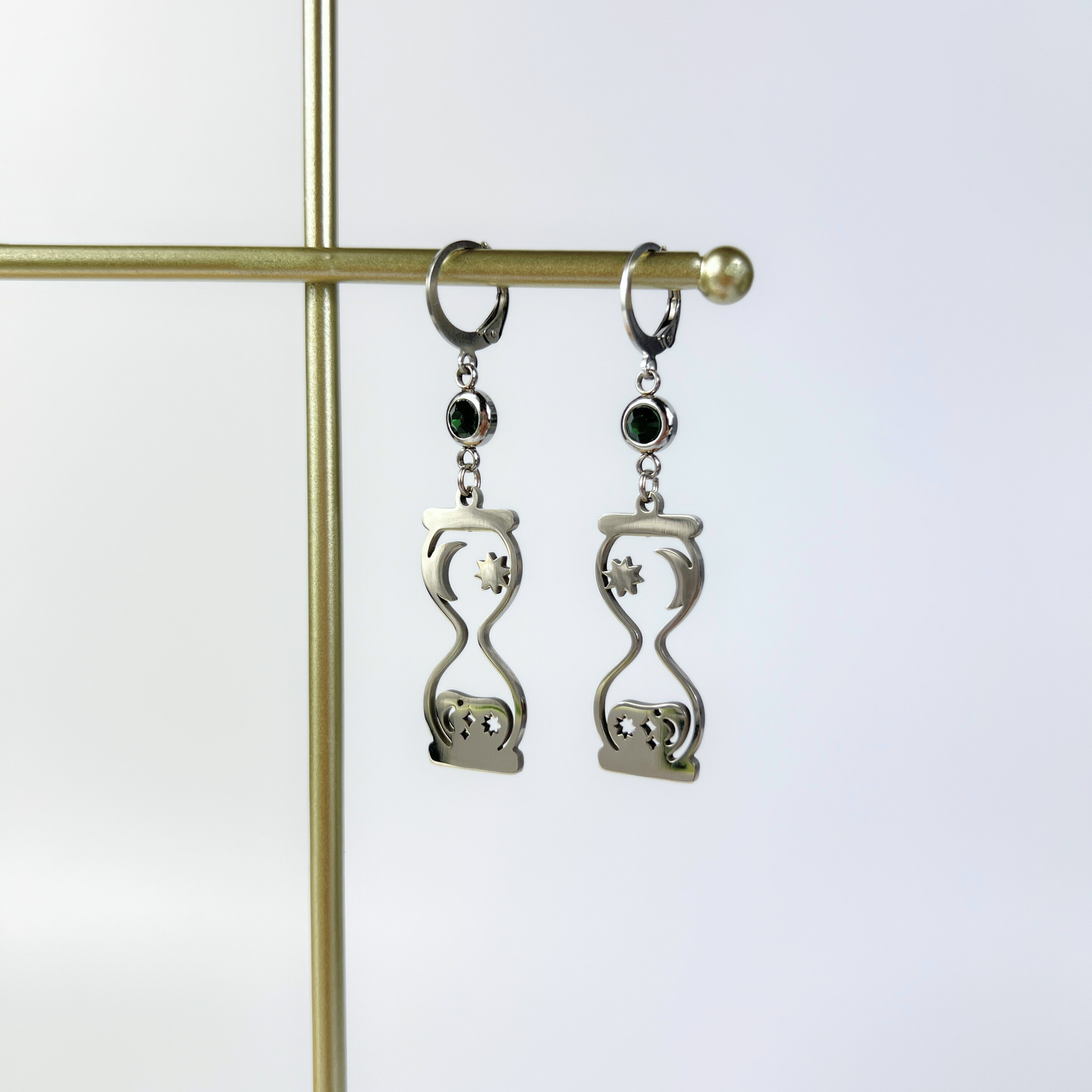 Celestial hourglass earrings with emerald green rhinestones Baguette Magick