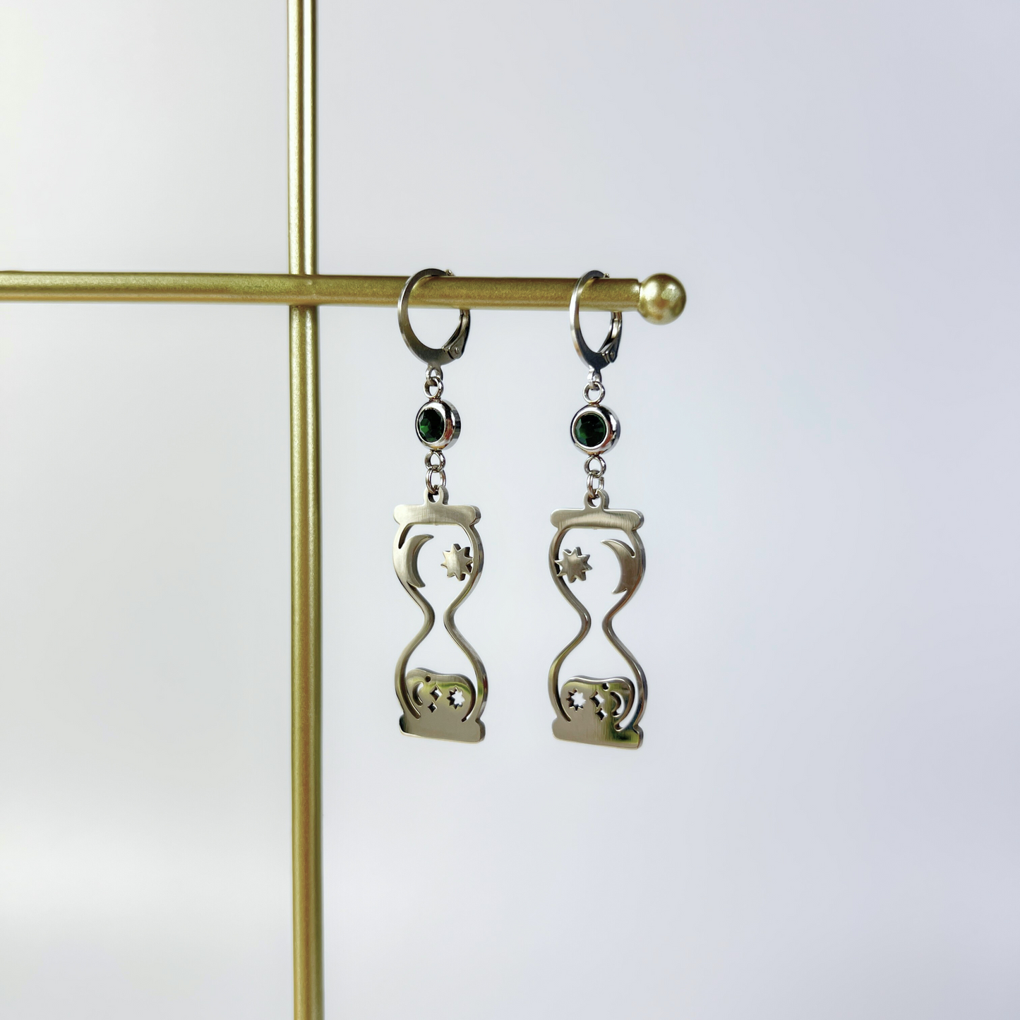 Celestial hourglass earrings with emerald green rhinestones Baguette Magick