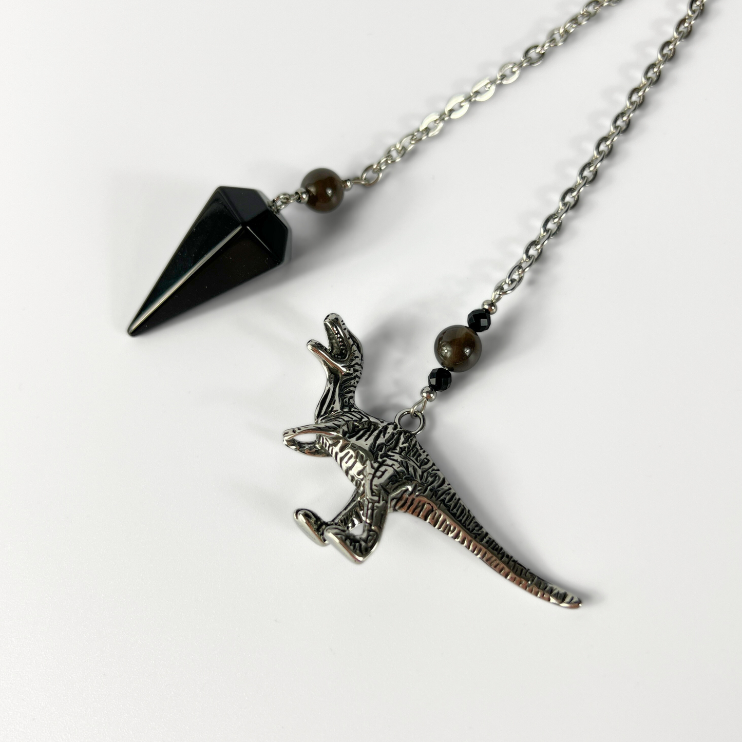 Velociraptor dinosaur dowsing pendulum, obsidian, smoky obsidian, onyx Baguette Magick