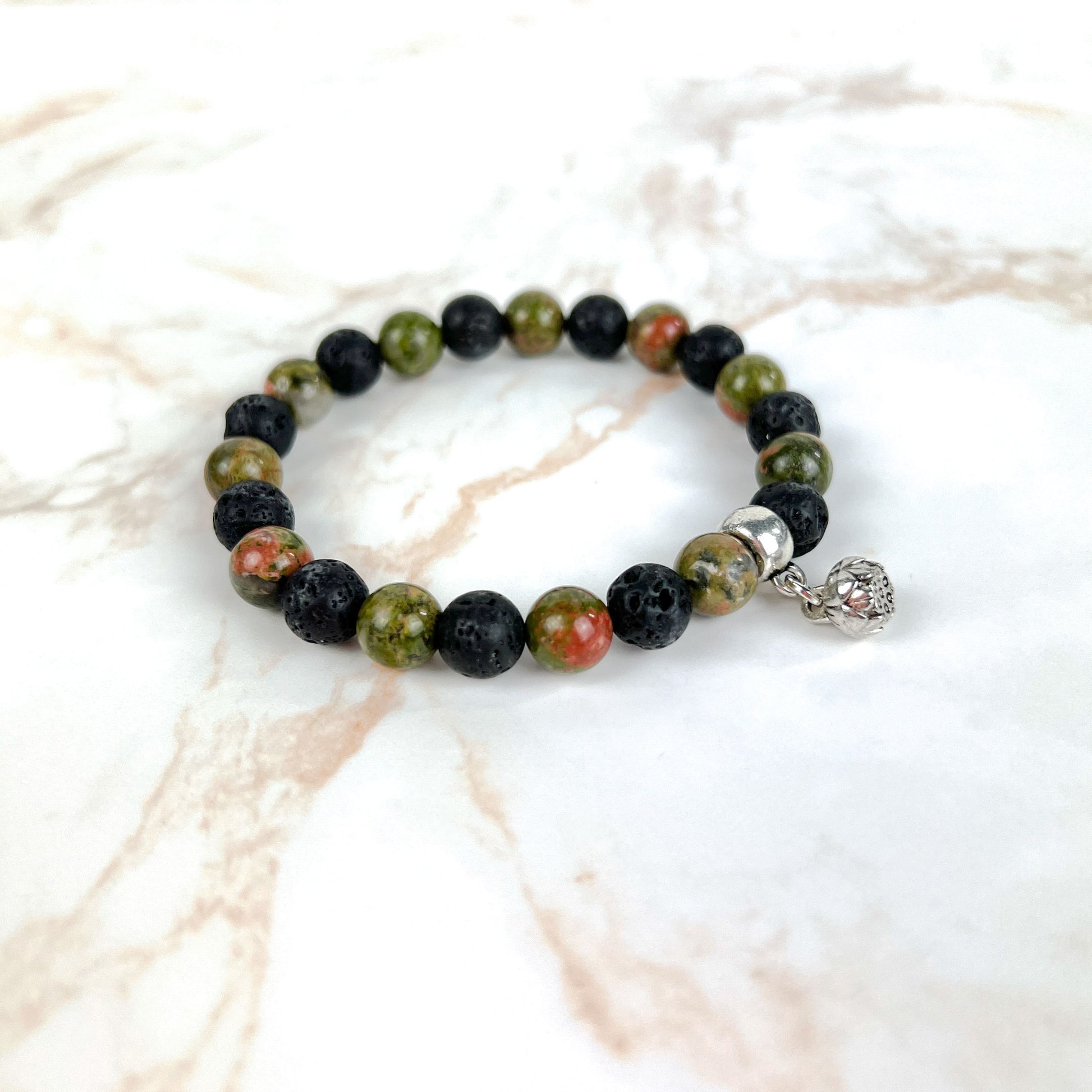Unakite and lava mala beaded bracelet with a lotus seed charm Baguette Magick