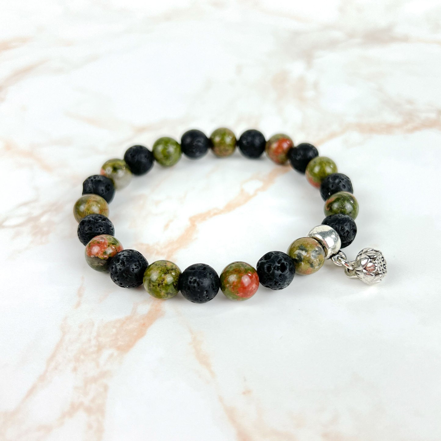Unakite and lava mala beaded bracelet with a lotus seed charm Baguette Magick