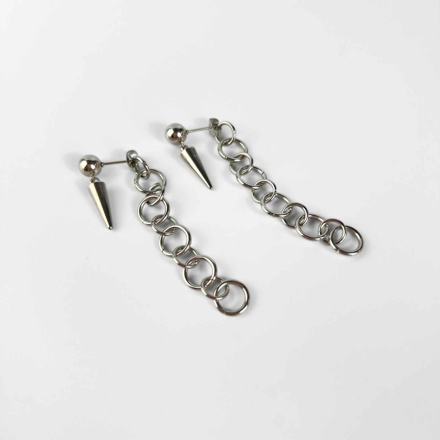 Spikes and back chunky chain stud earrings Baguette Magick