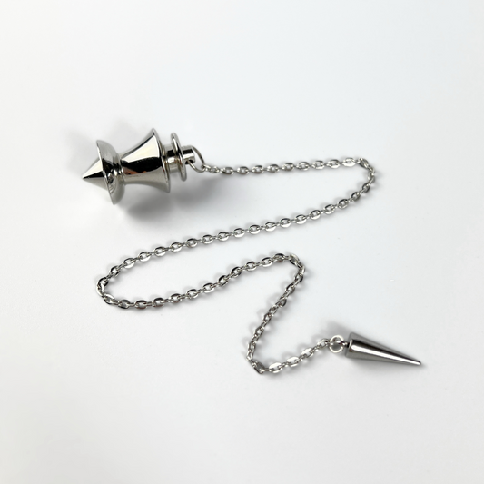 Point and dome dowsing metal pendulum with a spike charm