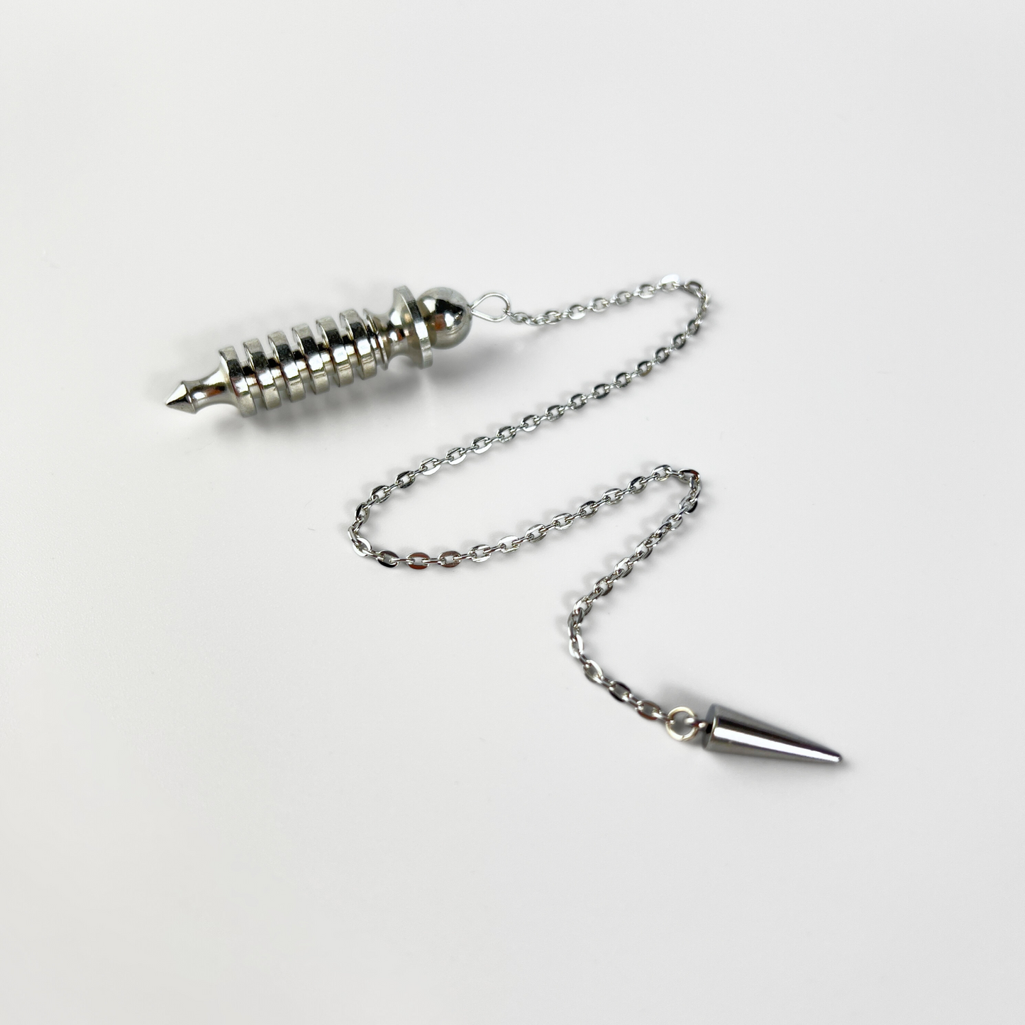 Egyptian Isis metal dowsing pendulum with a chamber