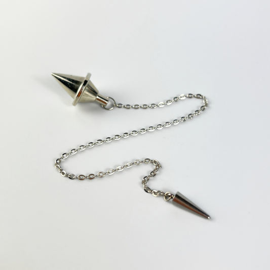 Silver-tone double cone pendulum with a spike charm Baguette Magick