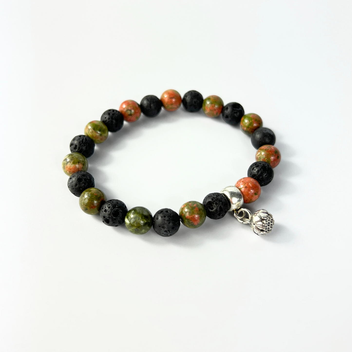 Unakite and lava mala beaded bracelet with a lotus seed charm