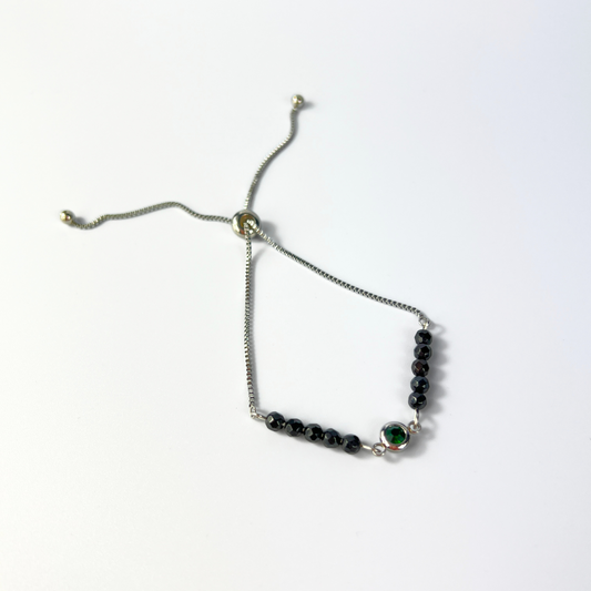 Faceted onyx and emerald green rhinestone slider bracelet