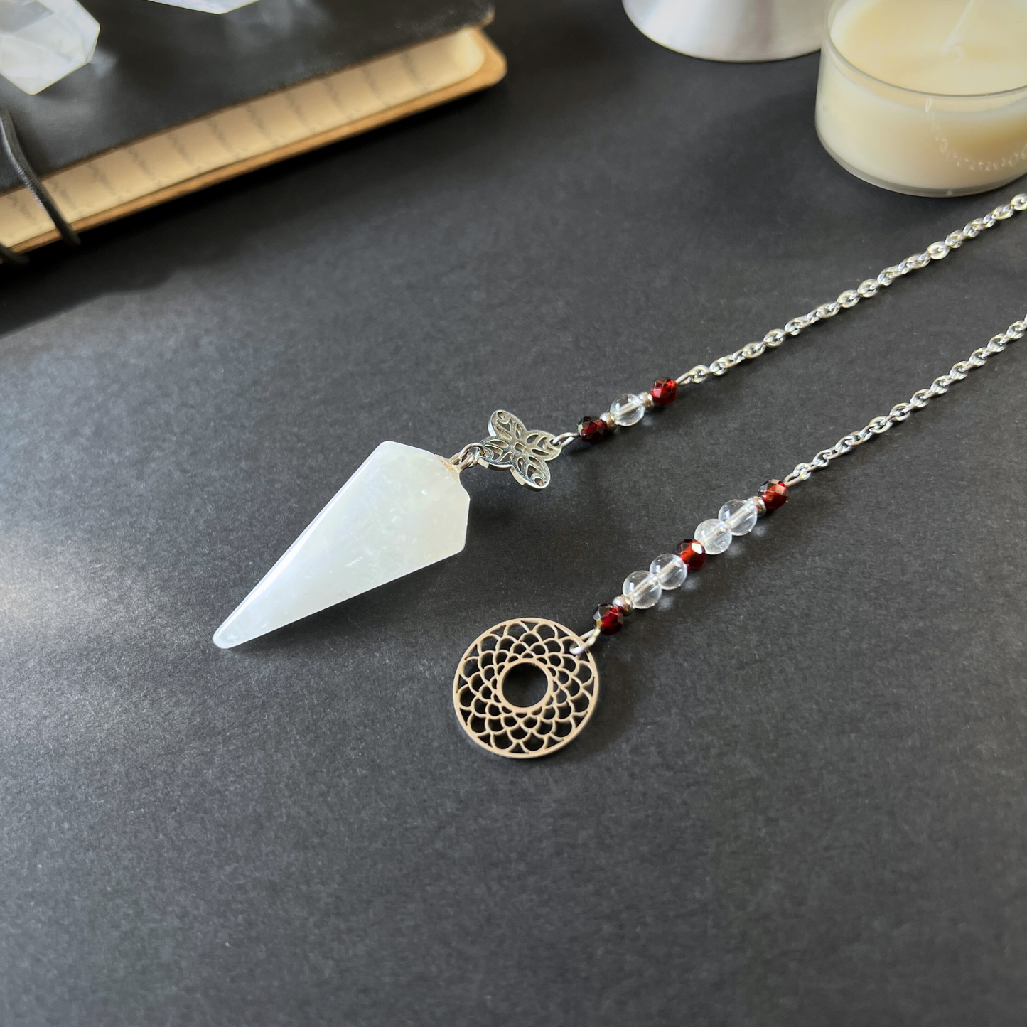 Quartz, garnet sacred geometry pendulum
