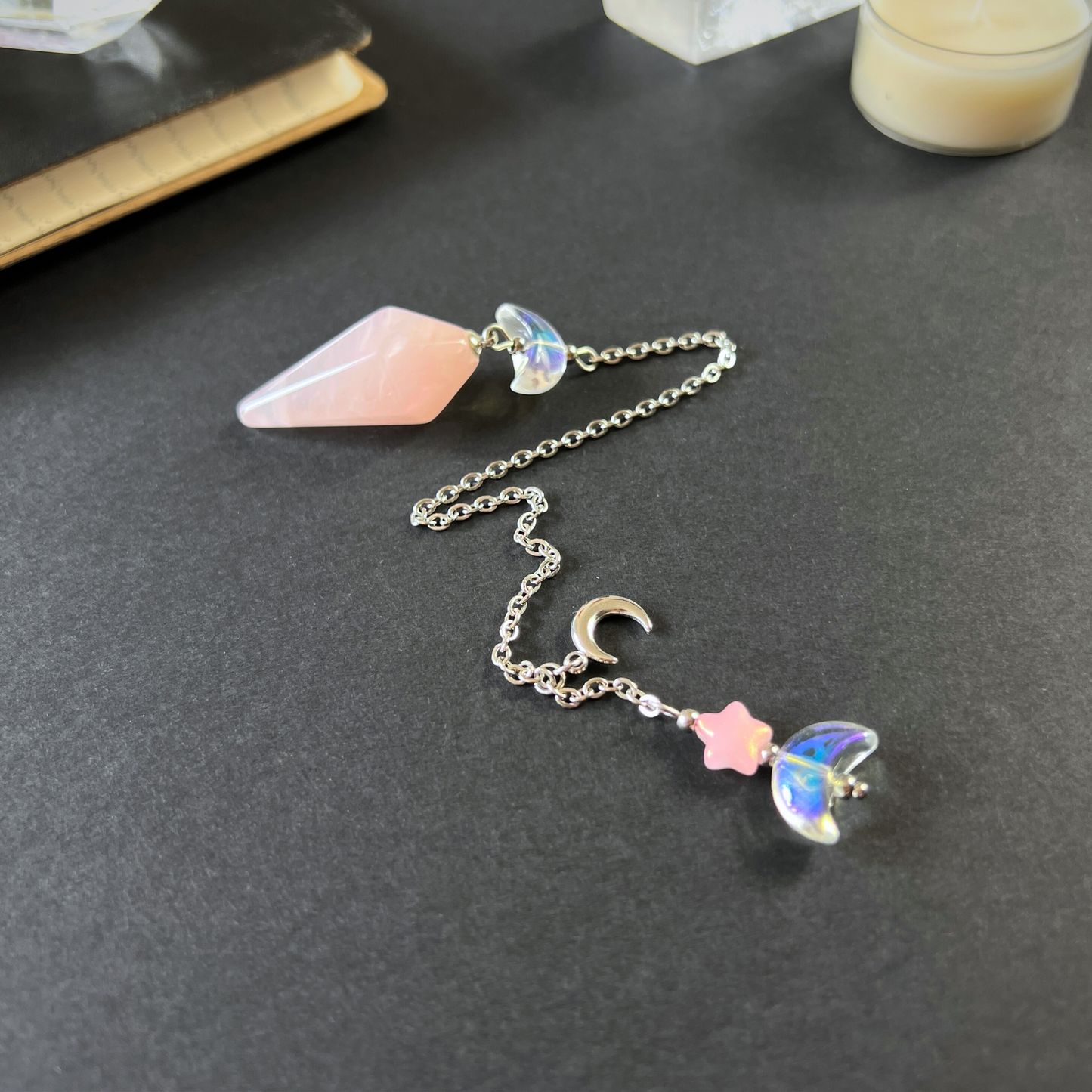 Celestial rose quartz dowsing pendulum, with moon & star charms