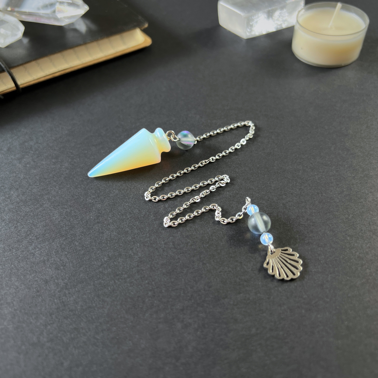 Sea witch pendulum made with opalite, mermaid glass