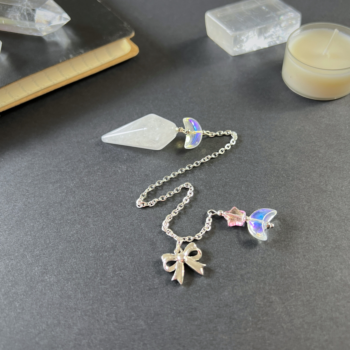 Celestial Clear Quartz dowsing pendulum, with moon, star & bow charms