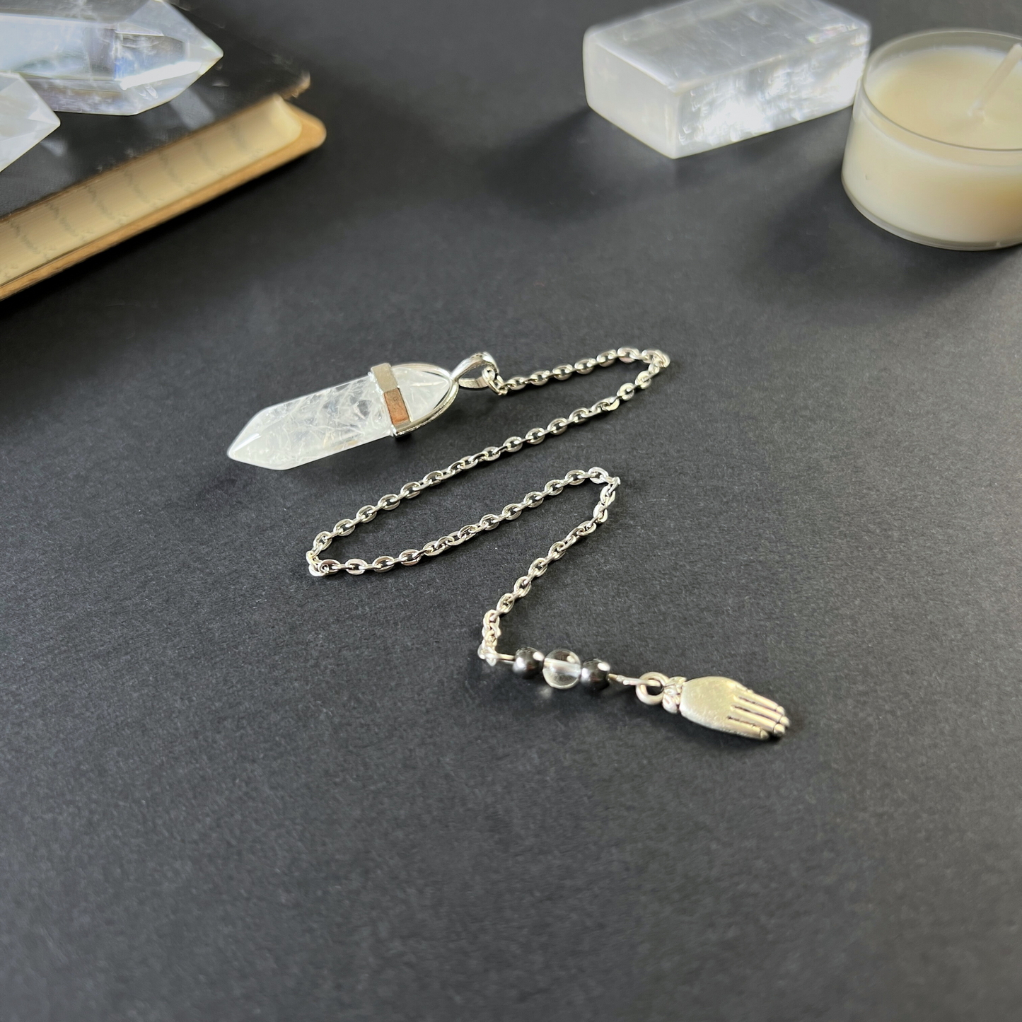 Quartz and hematite hand pendulum